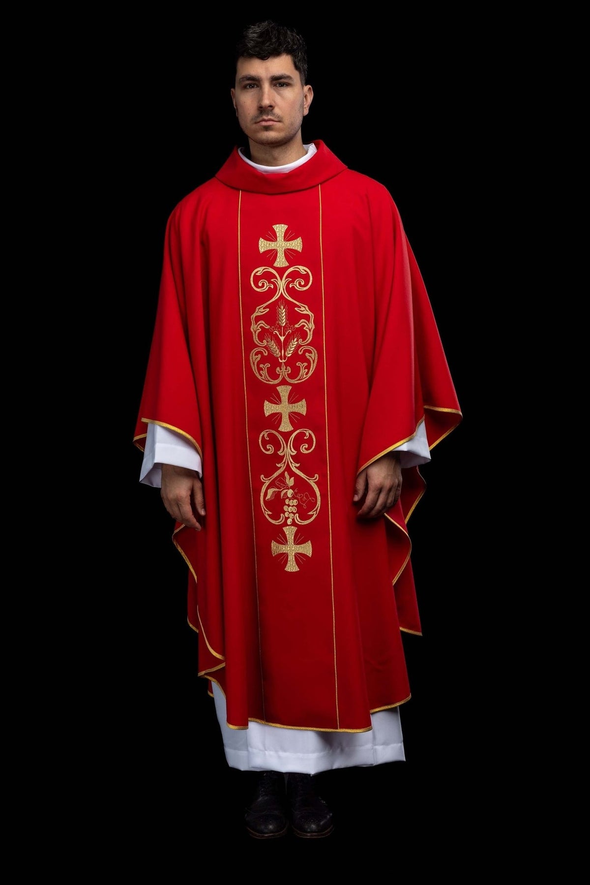 Red chasuble, full front view with gold embroidered orphrey and cross motifs