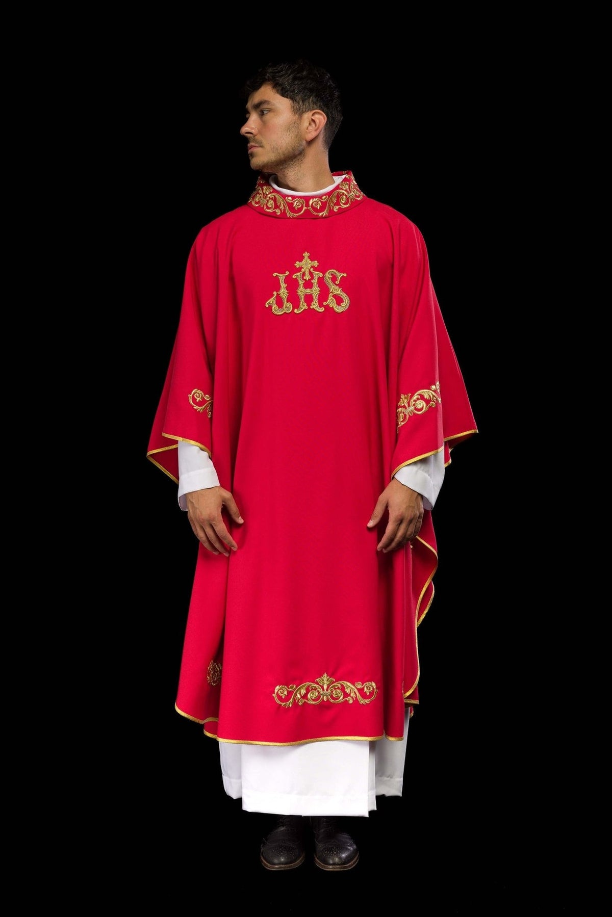 Red chasuble back view with gold IHS embroidery and decorative trim