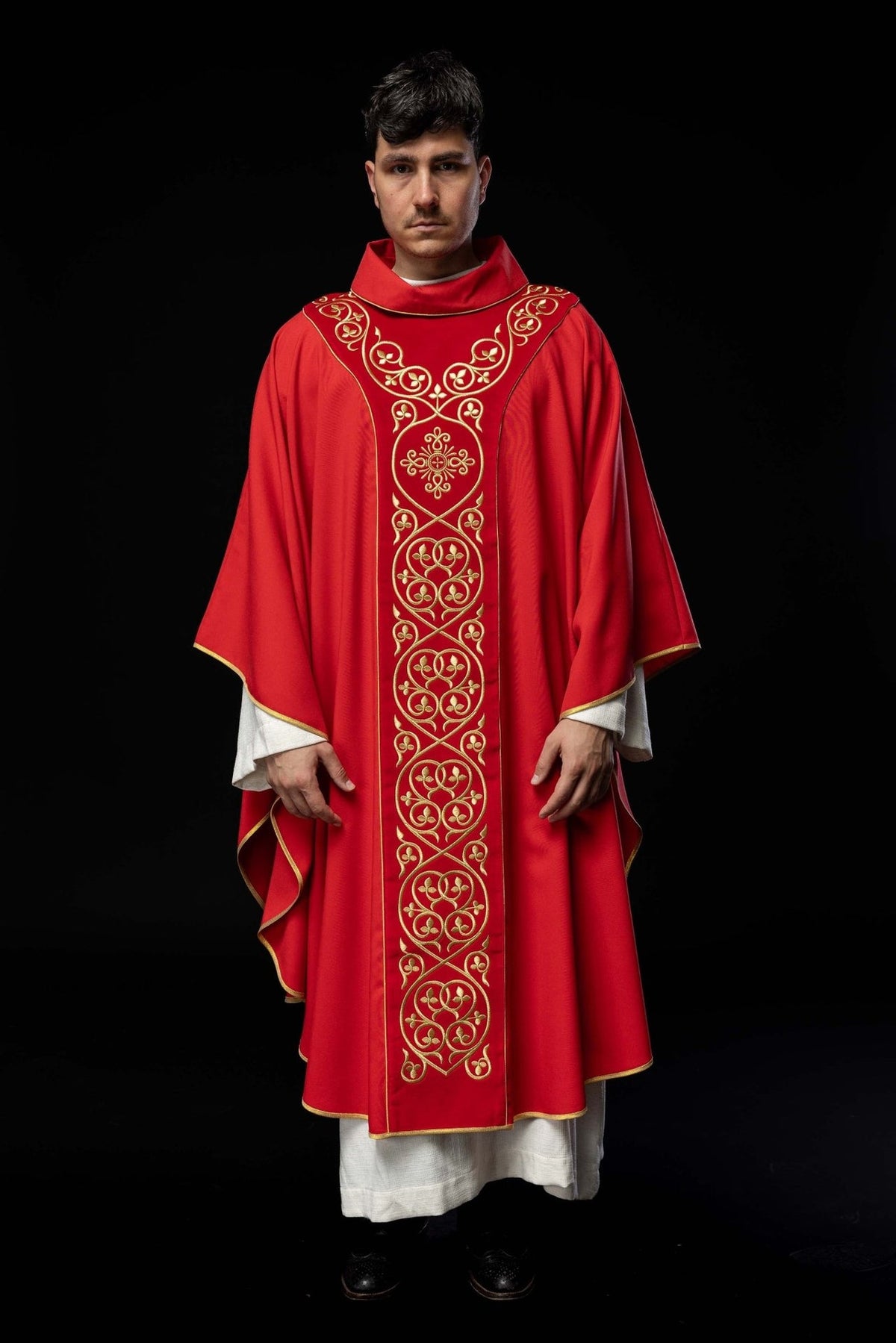 Red chasuble front view with gold embroidered orphrey and trim