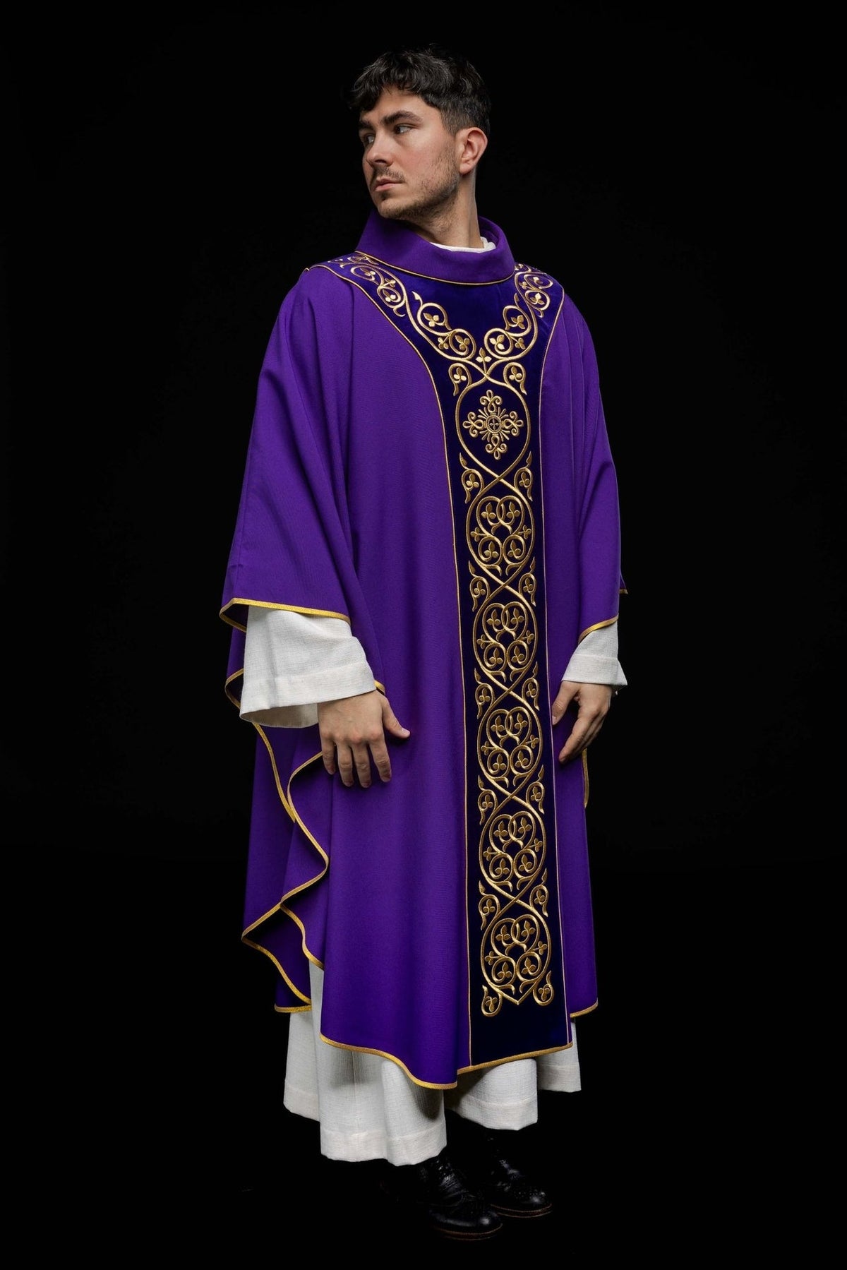 Purple chasuble, front three-quarter view with long embroidered velvet orphrey