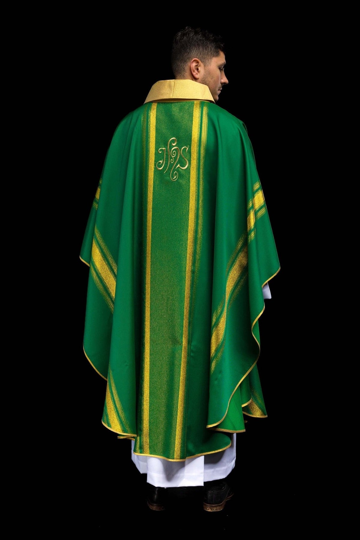 Green chasuble back view with gold IHS embroidery and vertical trim