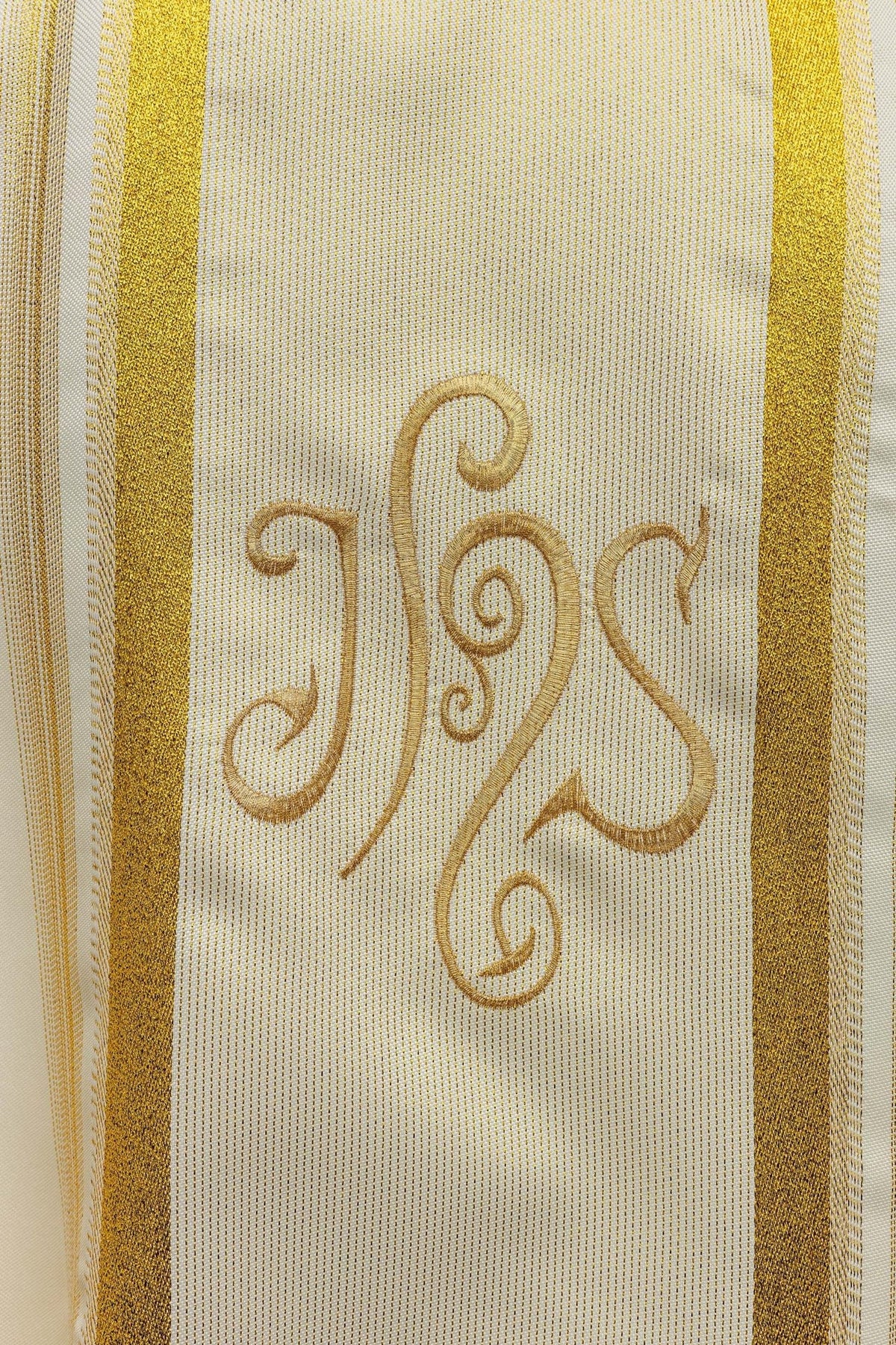 Chasuble back view showing gold trim and IHS embroidery