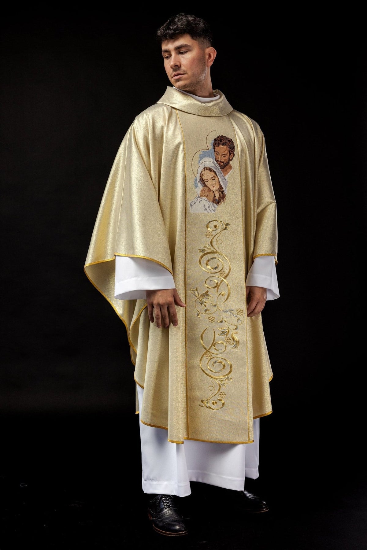Gold chasuble front view with embroidered Holy Family and floral scrollwork