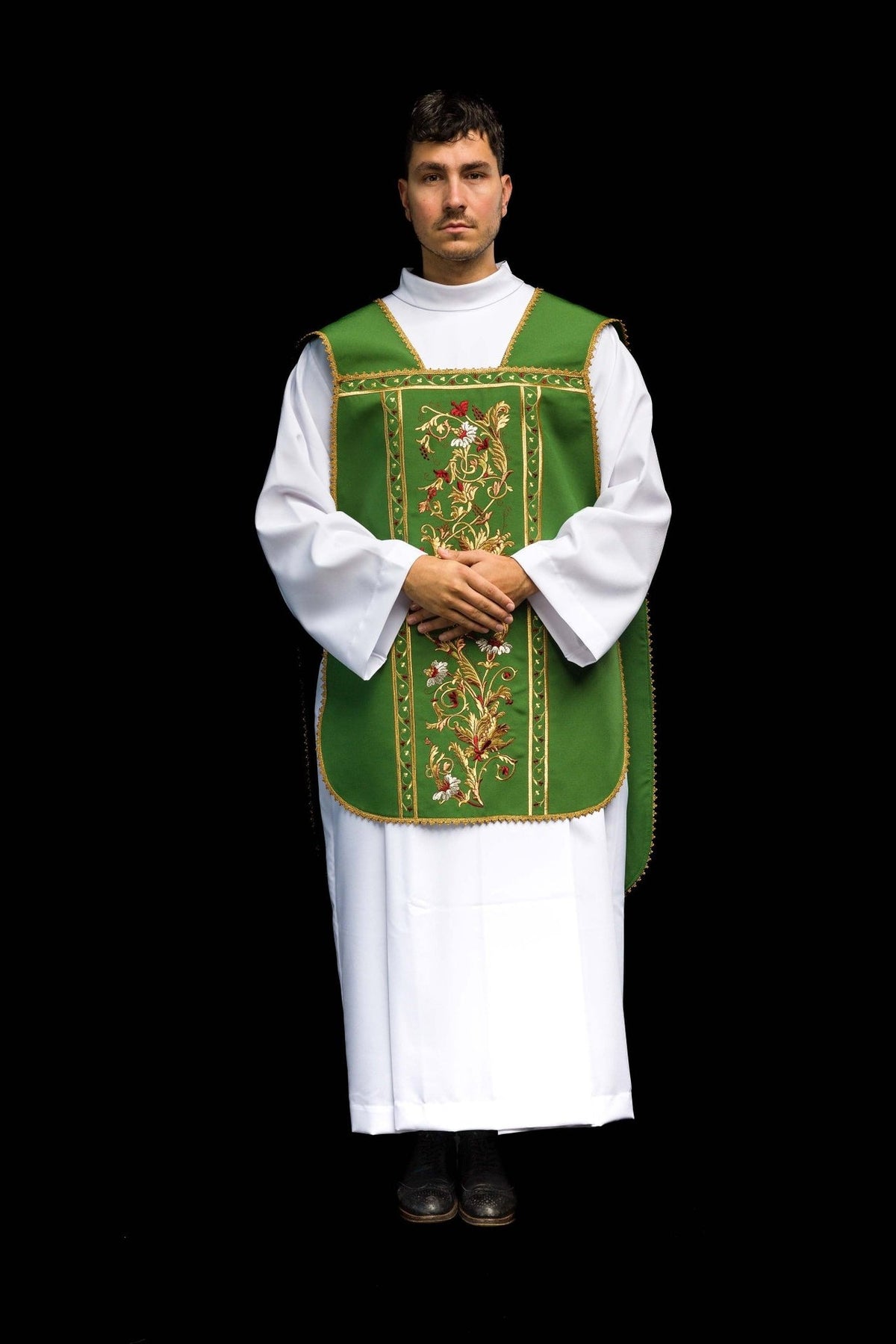 Green Roman chasuble worn, front view with embroidered floral panel and gold trim