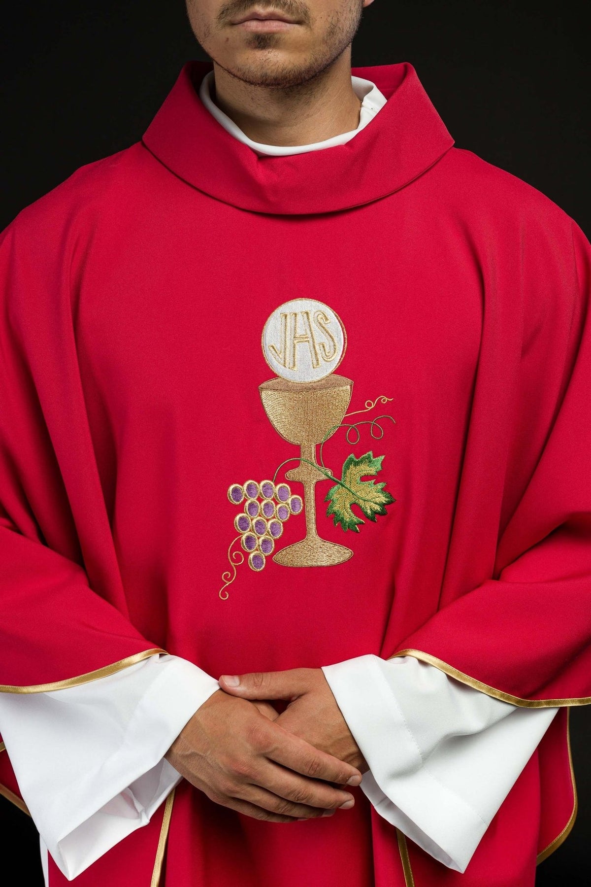 Red chasuble, front view showing chalice and grapes embroidery with gold trim