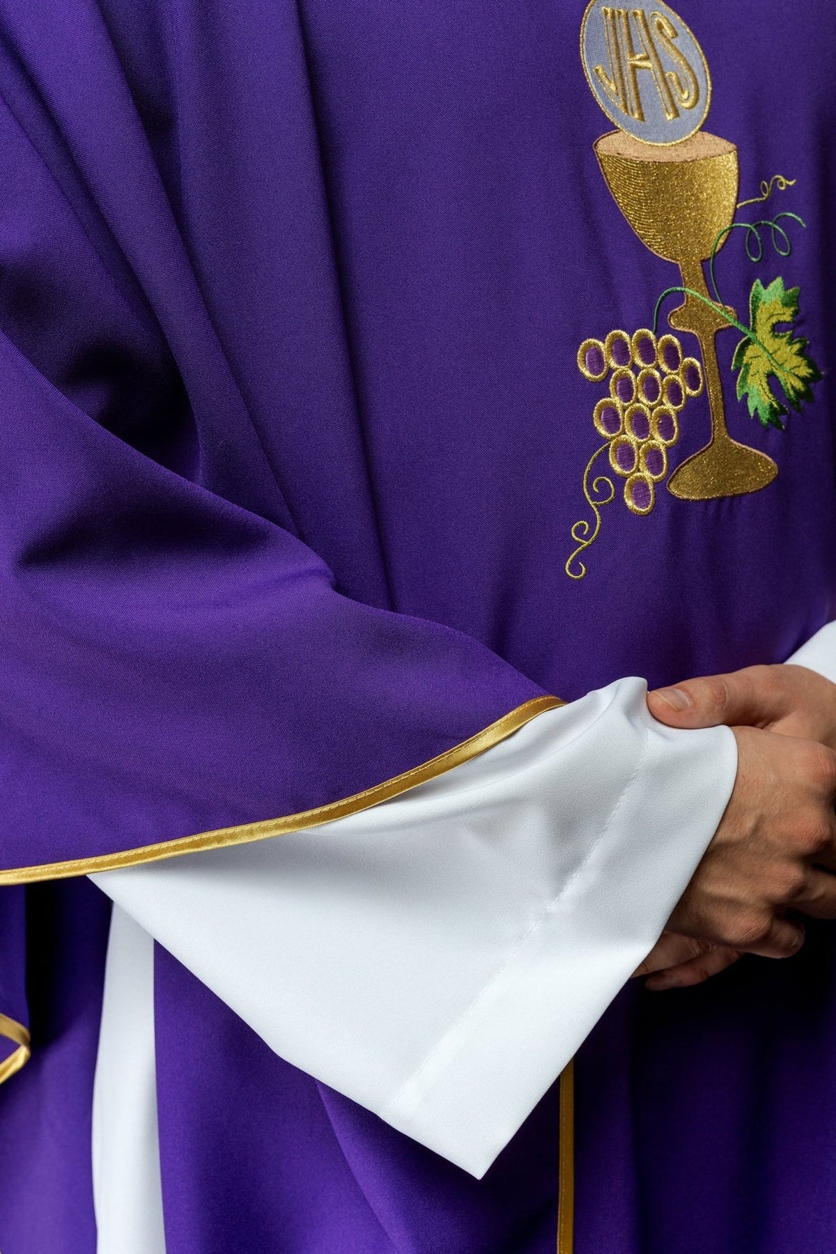 Purple chasuble side close-up with chalice and grapes embroidery