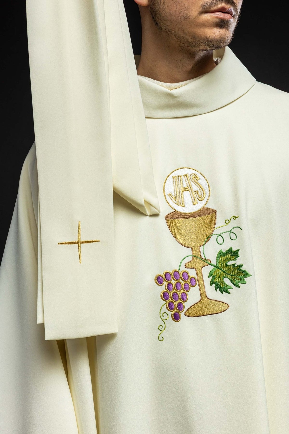 Ecru chasuble front detail with gold cross, IHS, chalice and grapes embroidery