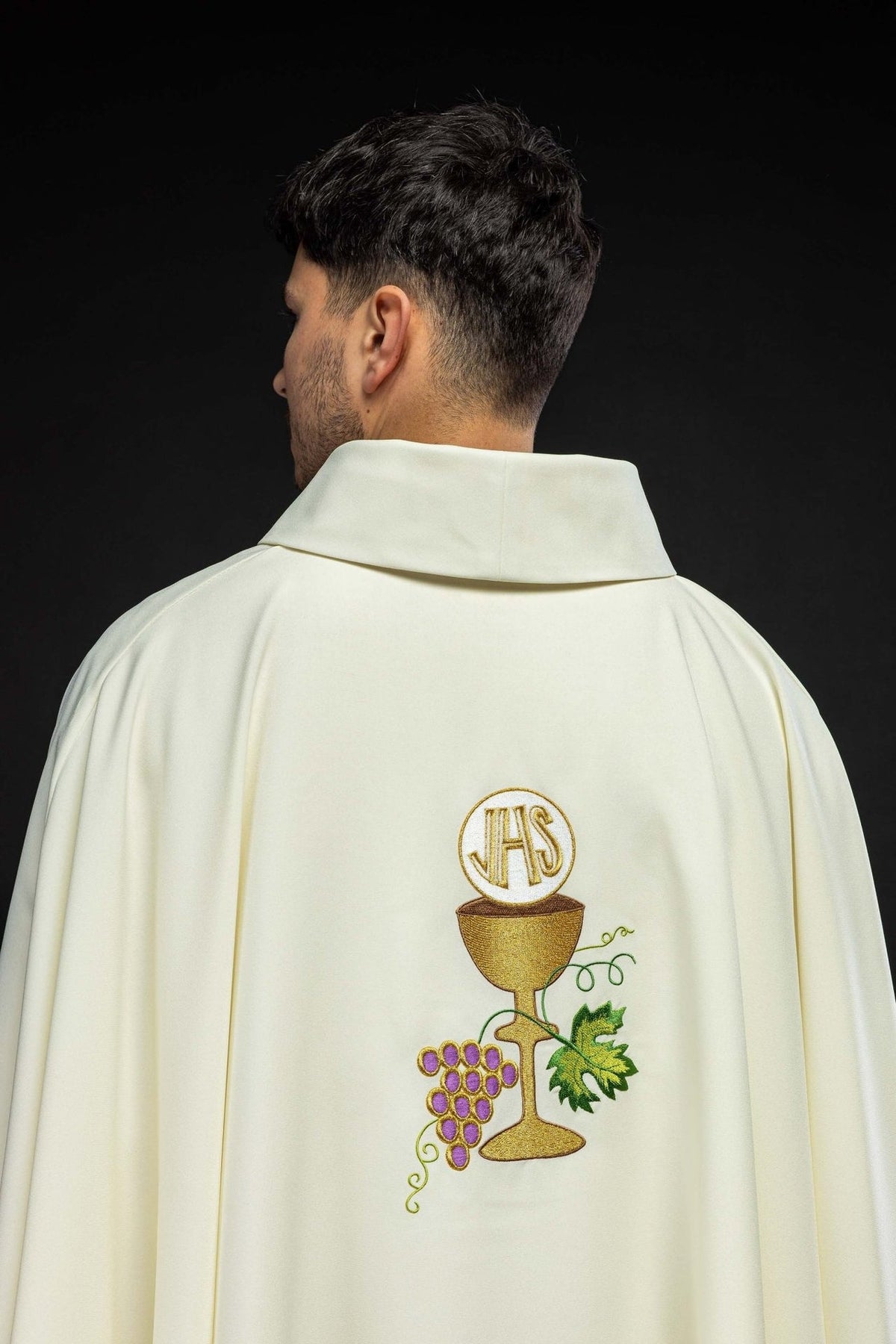 Ecru chasuble back view with IHS, chalice and grapes embroidery