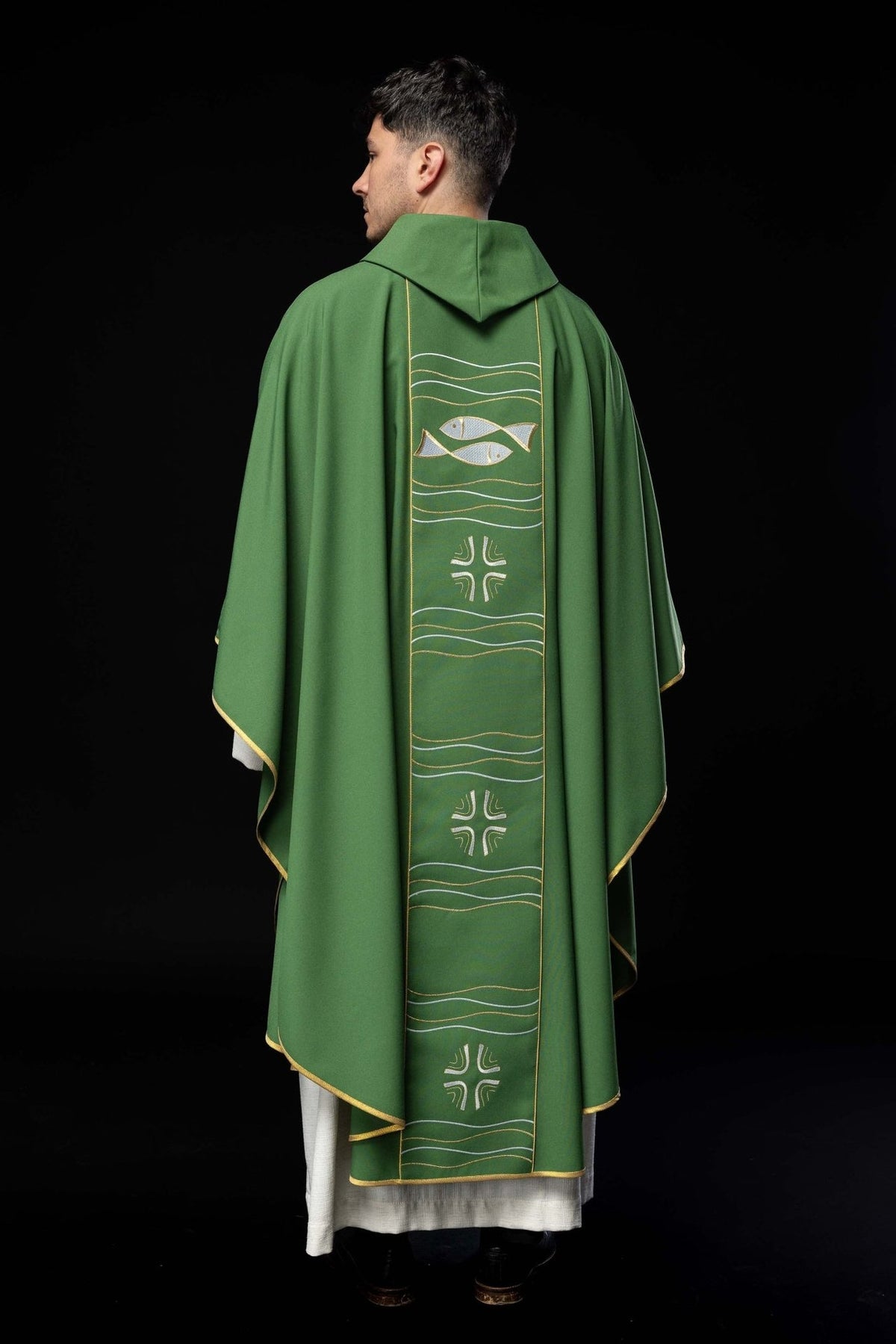Green chasuble back view with embroidered fish, cross and gold-trimmed orphrey