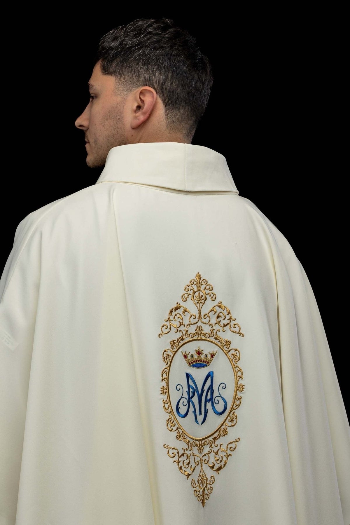 Marian chasuble back view with blue Marian motif and gold embroidery