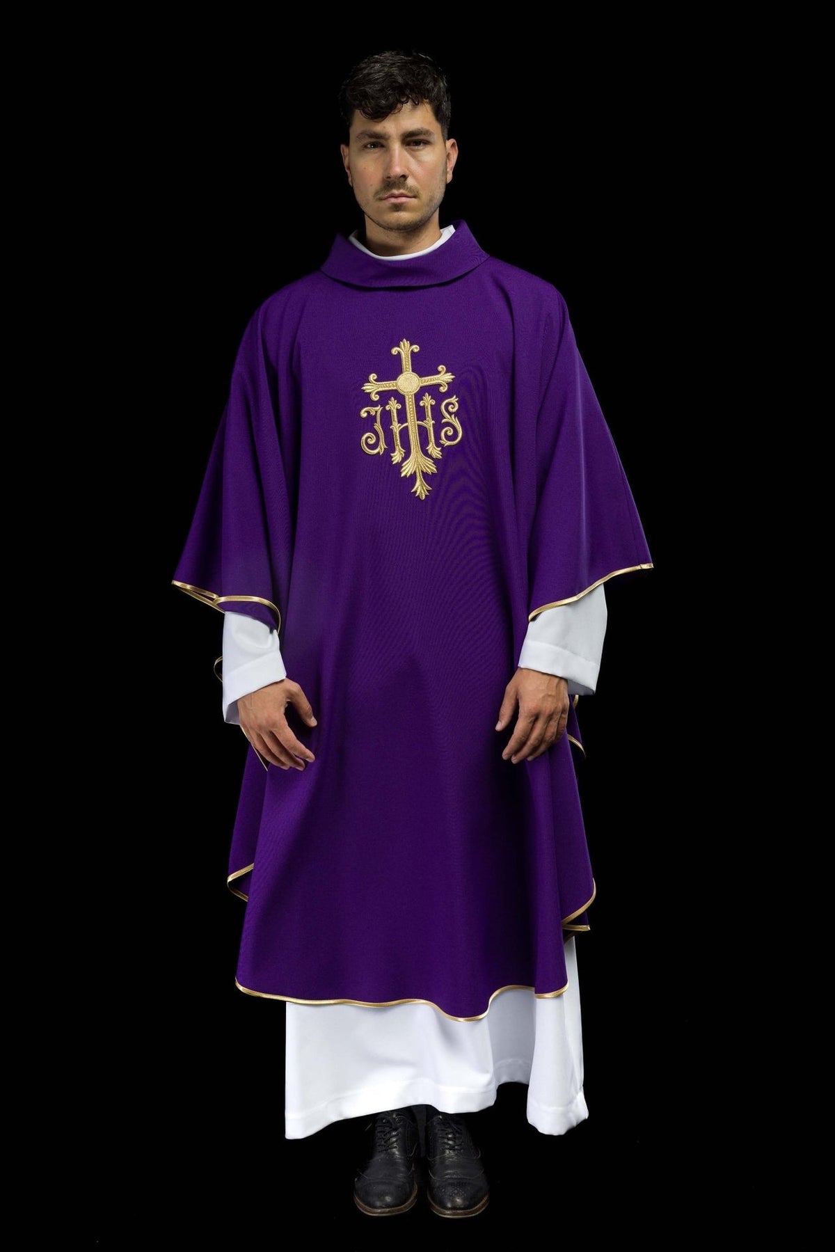 Purple chasuble worn full front, showing gold Cross and IHS embroidery