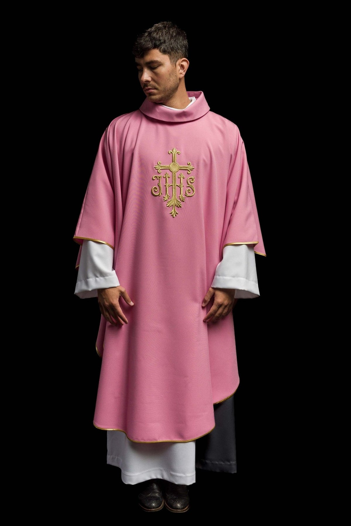 Rose chasuble front view with gold JHS embroidery and gold trim