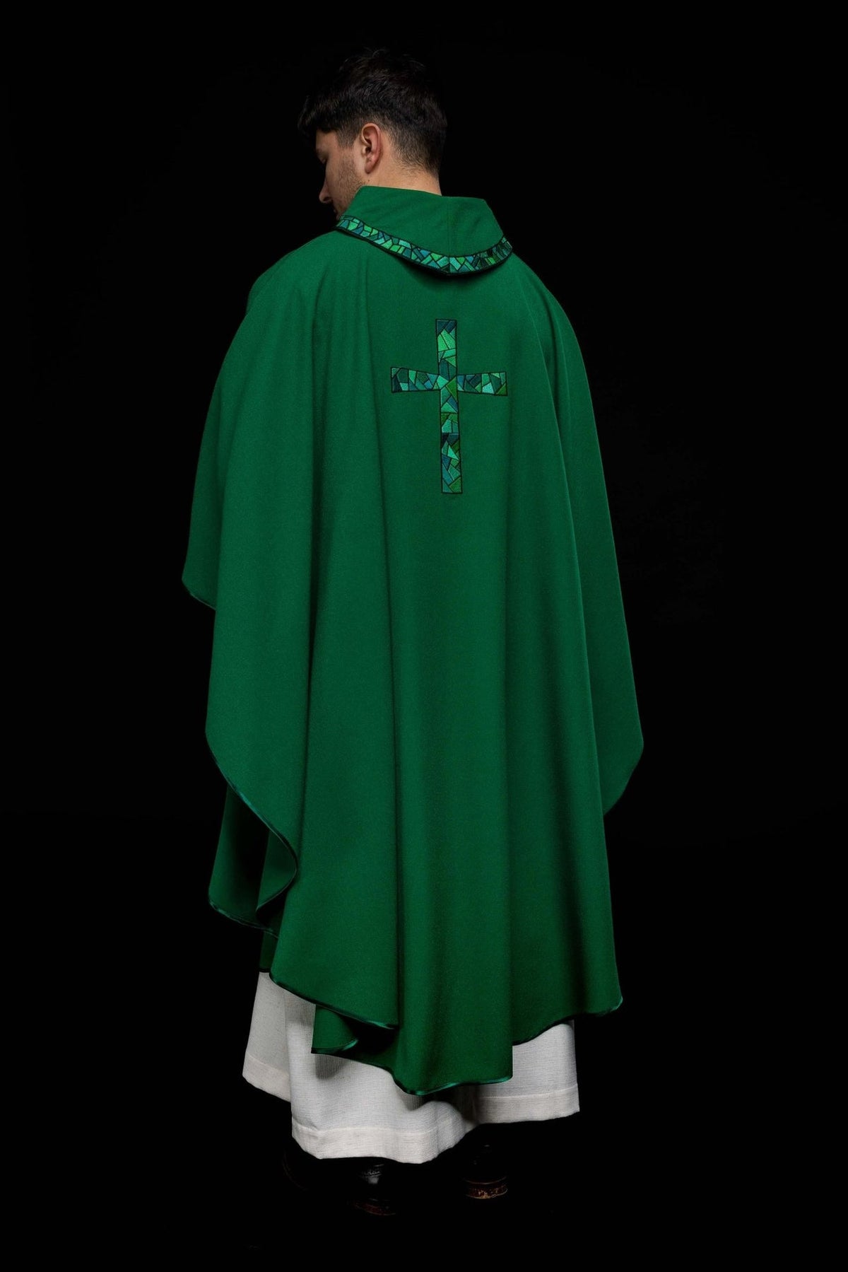 Green chasuble back view with mosaic cross