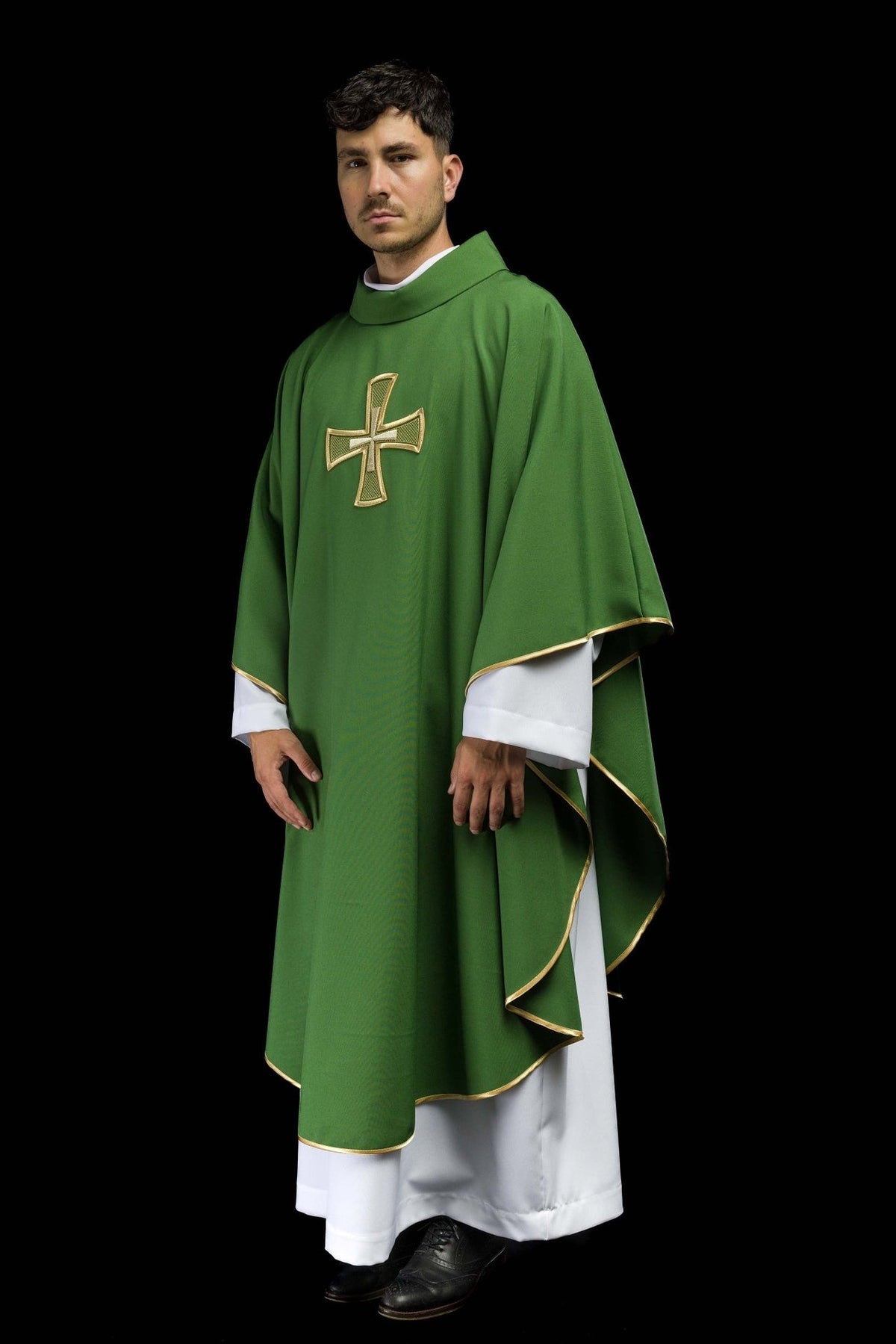 Green chasuble, angled front view with gold cross embroidery and trim