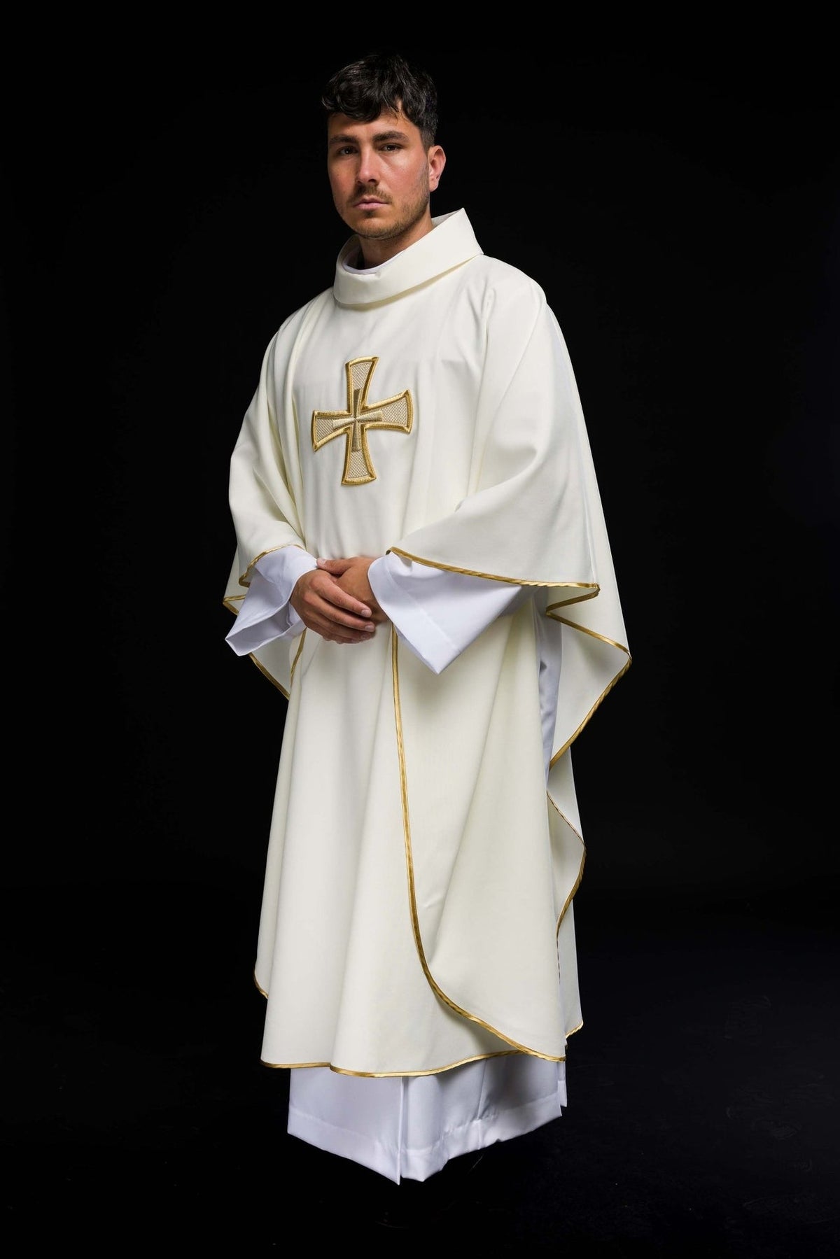 Ecru chasuble side view with stand-up collar, gold trim and cross embroidery