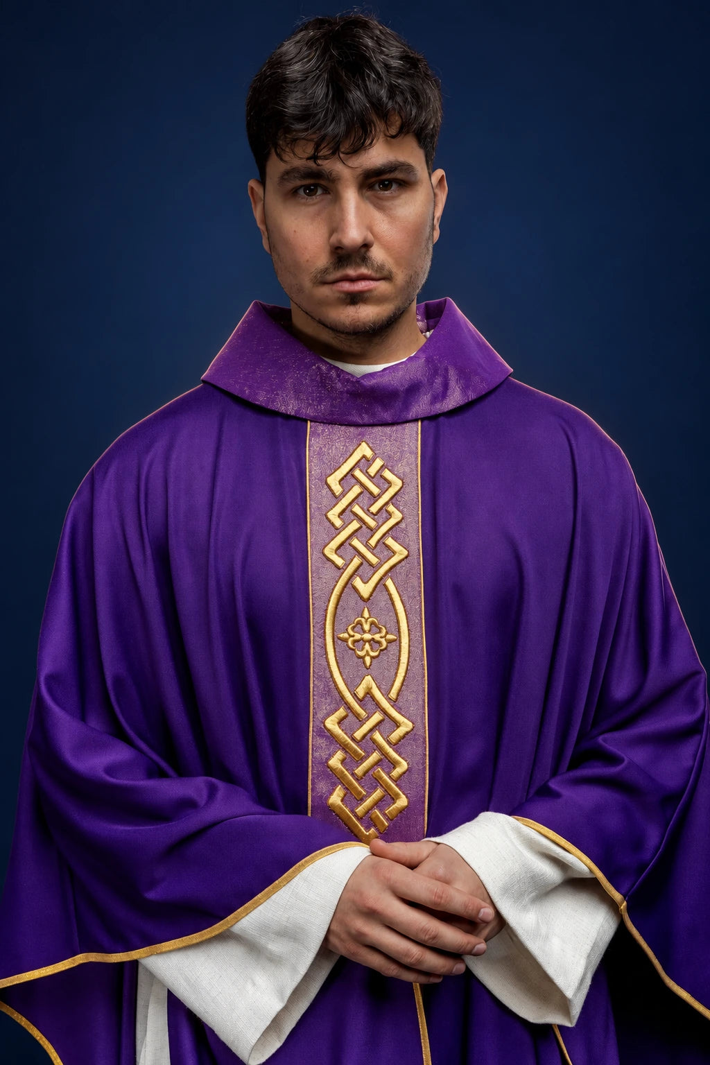 Embroidered Purple Chasuble with Decorative Orphrey, front view worn with gold embroidery and trim