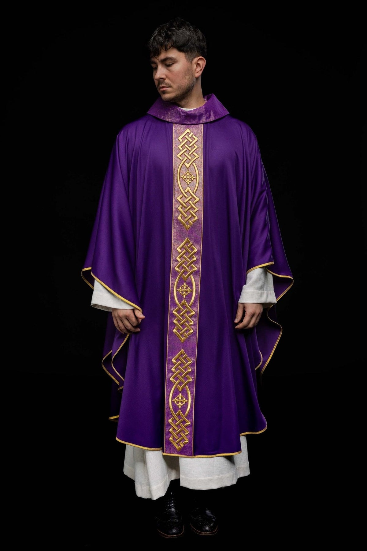 Purple chasuble full front view with decorative gold orphrey and trim