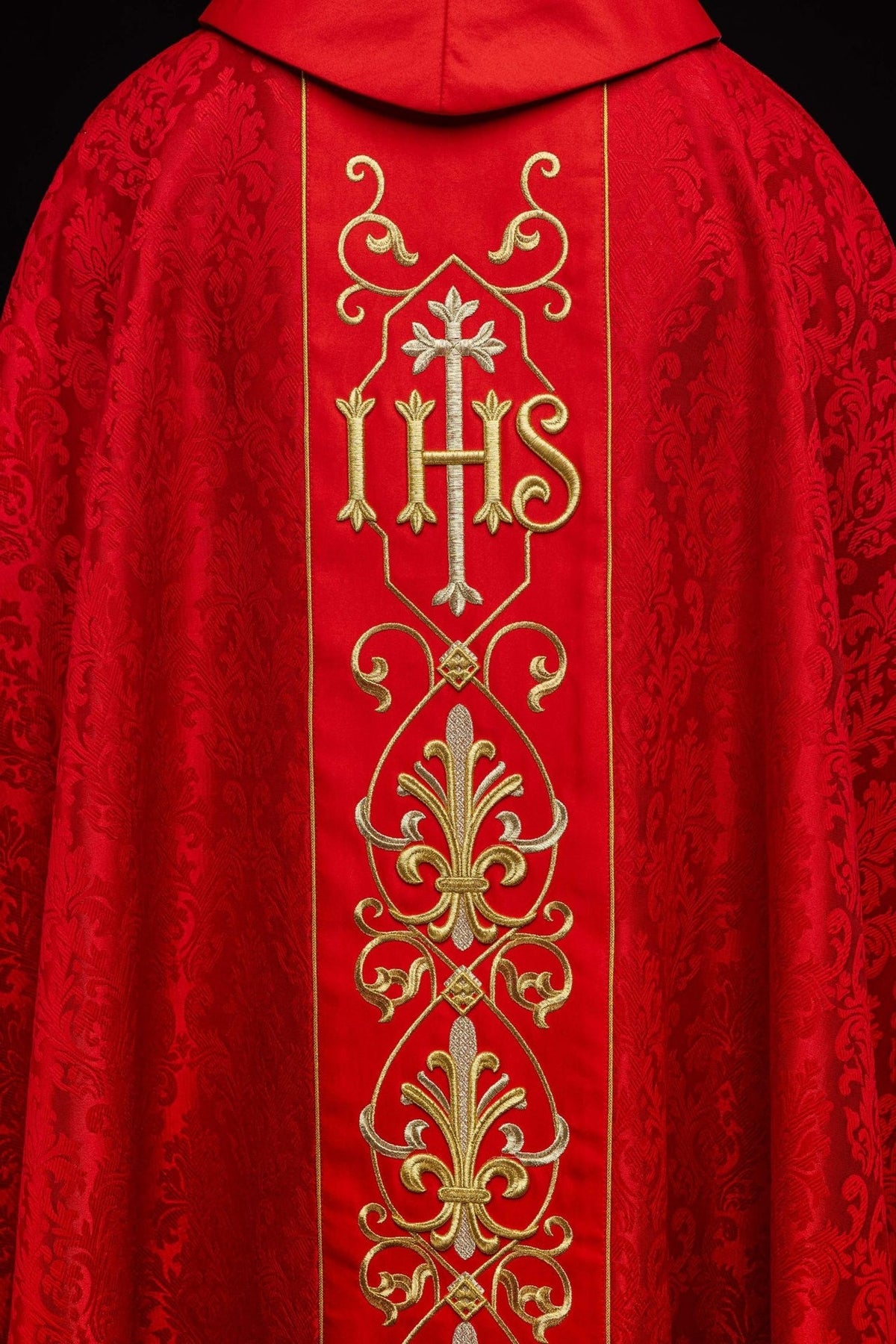 Red chasuble, back view with central embroidered IHS panel