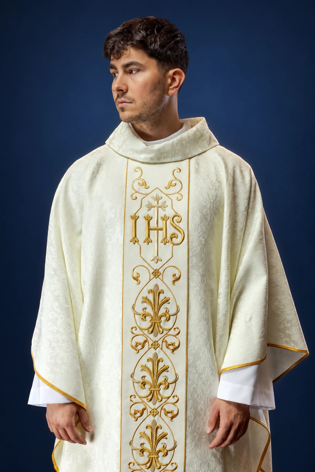 Ecru Catholic Chasuble with IHS Embroidery worn from the front, with gold embroidery and trim