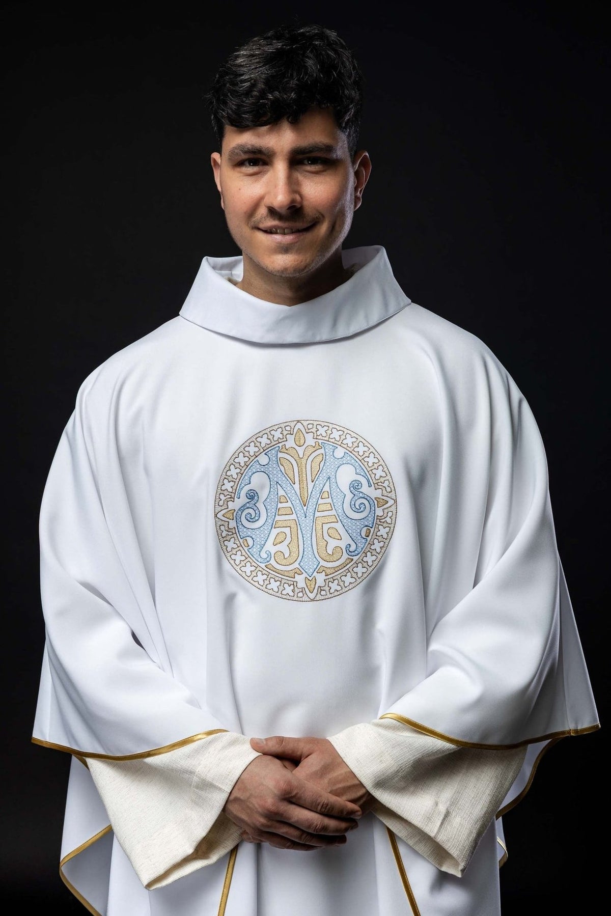 White Embroidered Marian Chasuble worn from the front, with gold trim and blue-and-gold Marian motif