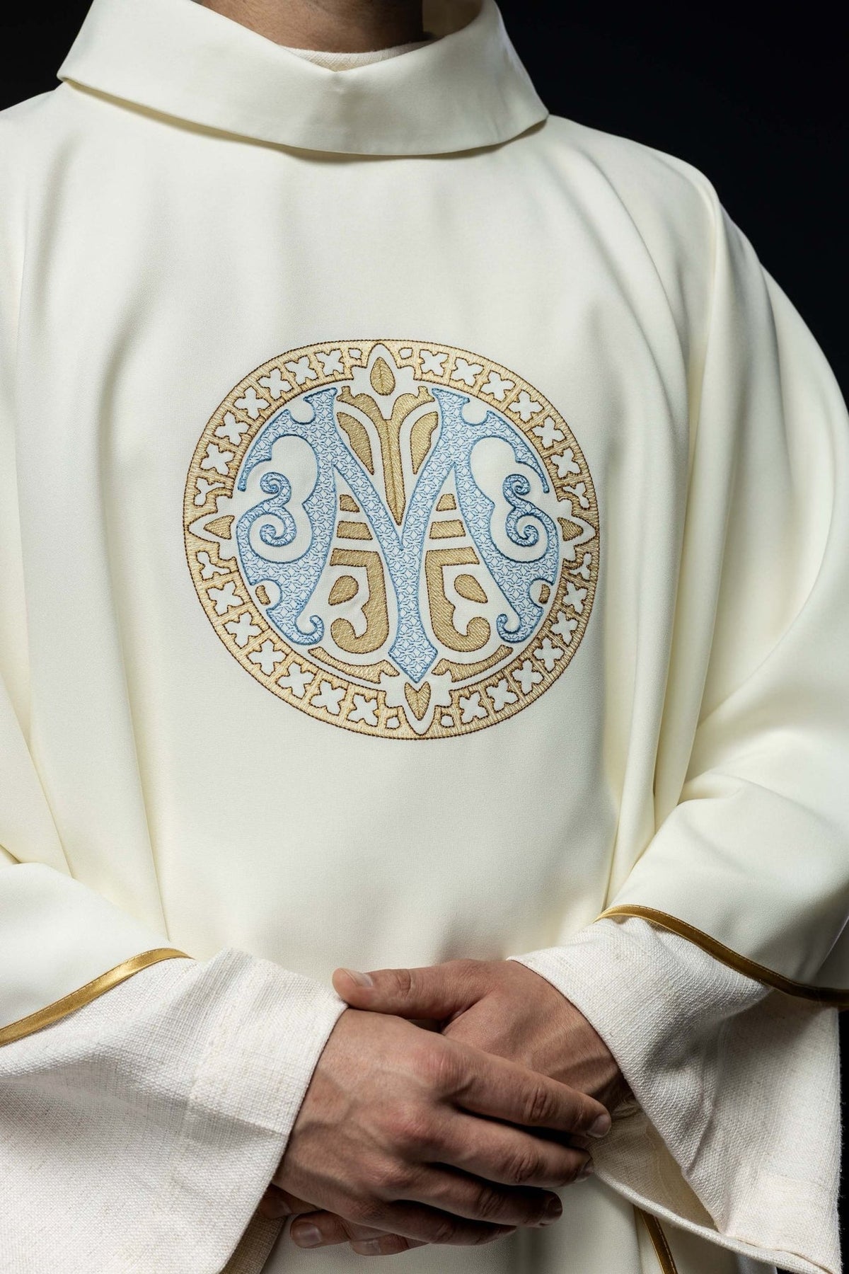 Marian chasuble close-up showing embroidered Marian motif and stand-up collar