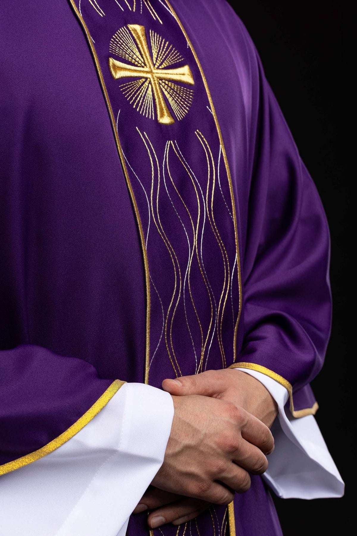 Purple chasuble side view showing embroidered gold cross orphrey and gold trim