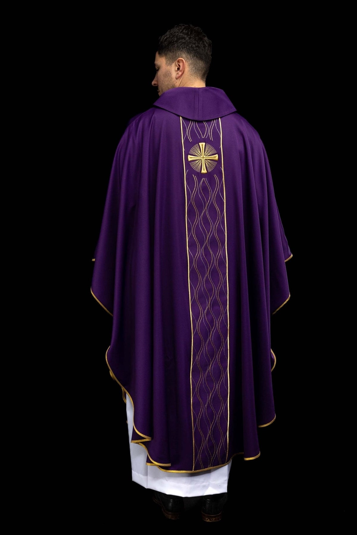 Purple chasuble back detail with gold cross embroidery and gold-trimmed orphrey