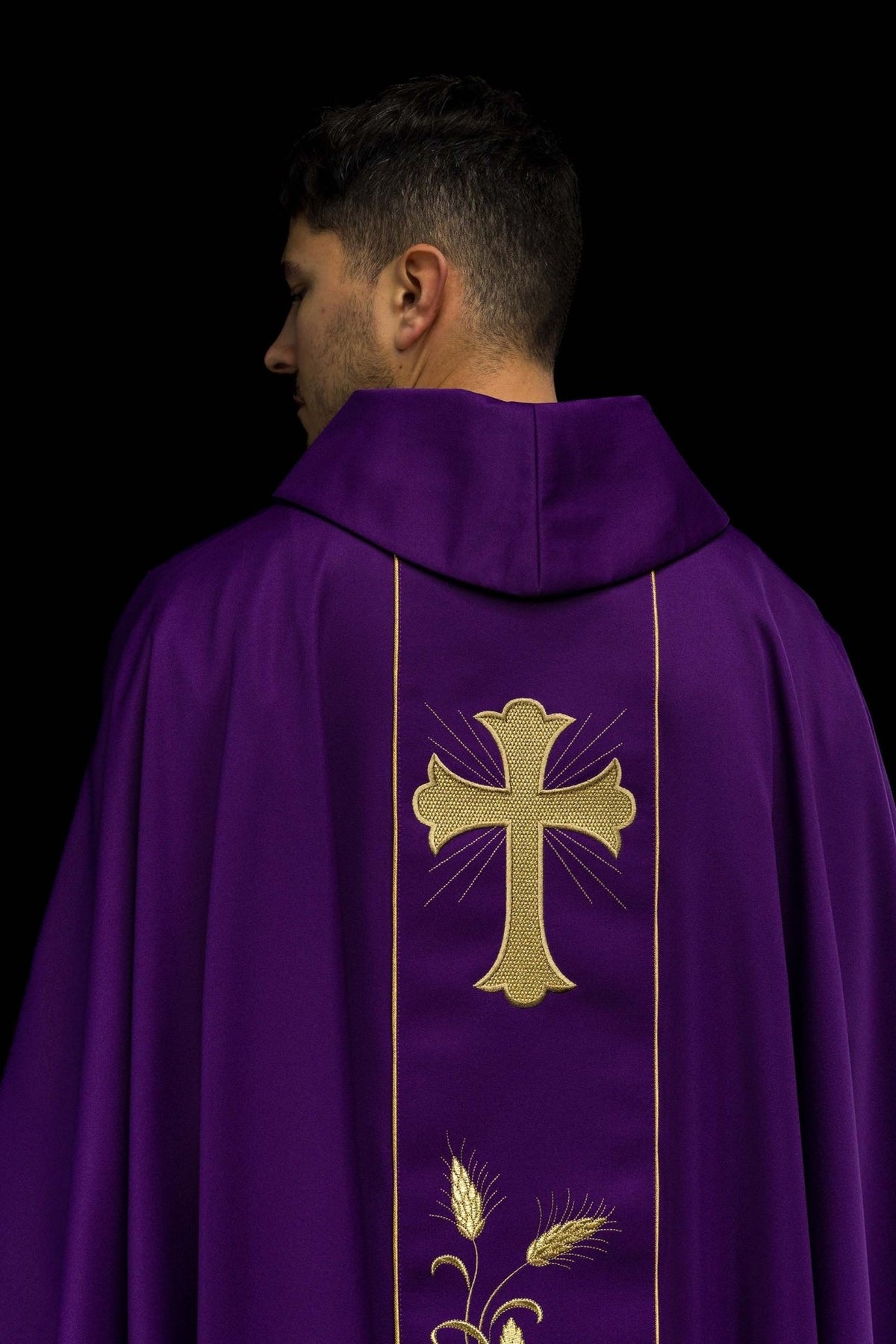 Purple chasuble back view with gold cross and wheat embroidery