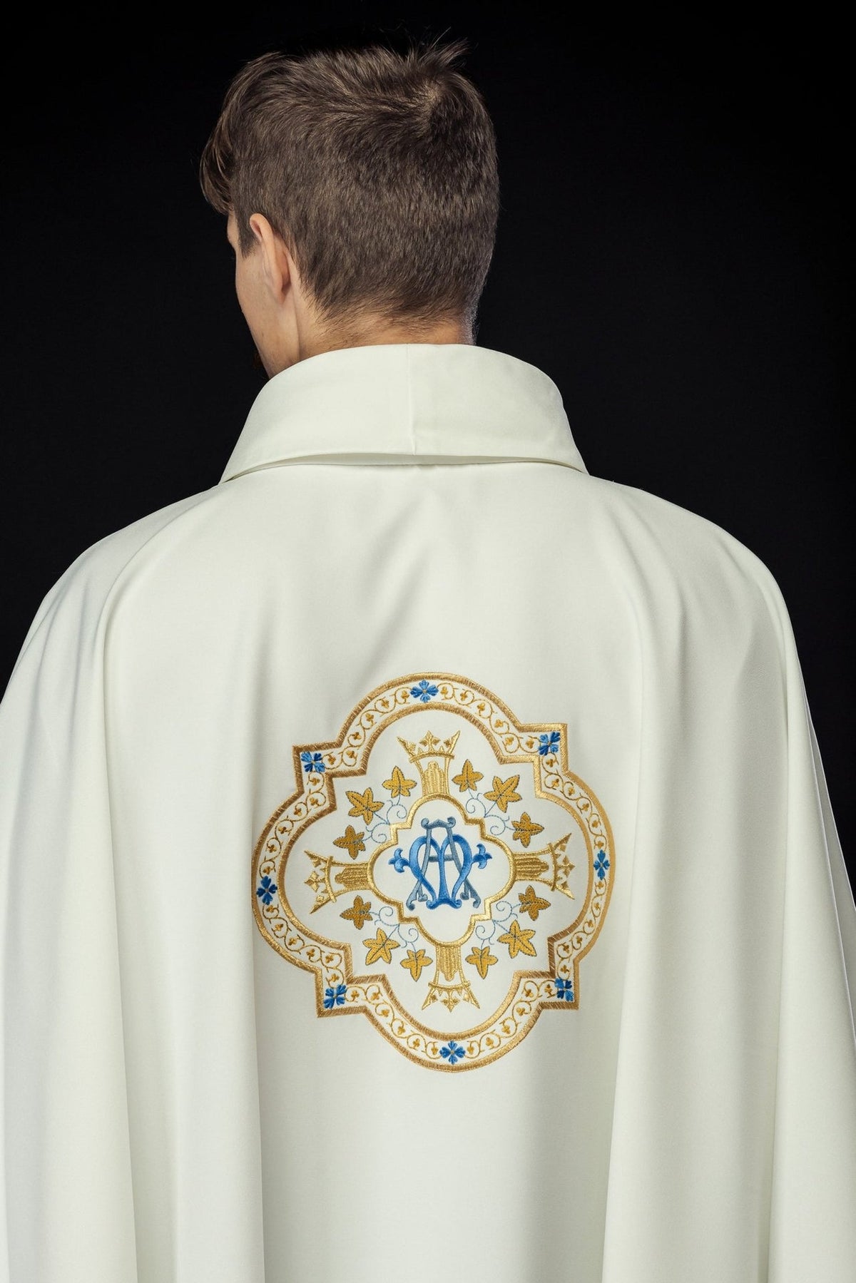 Marian chasuble, back view with embroidered blue and gold Marian motif