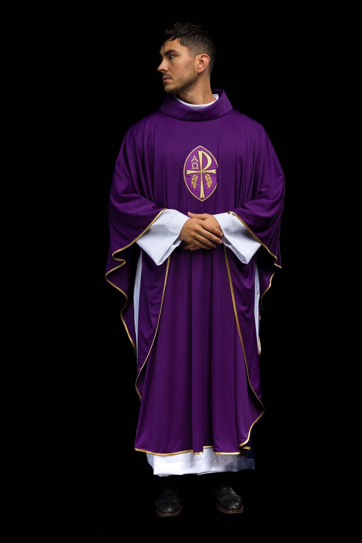 Purple embroidered cross chasuble, three-quarter front view with gold trim