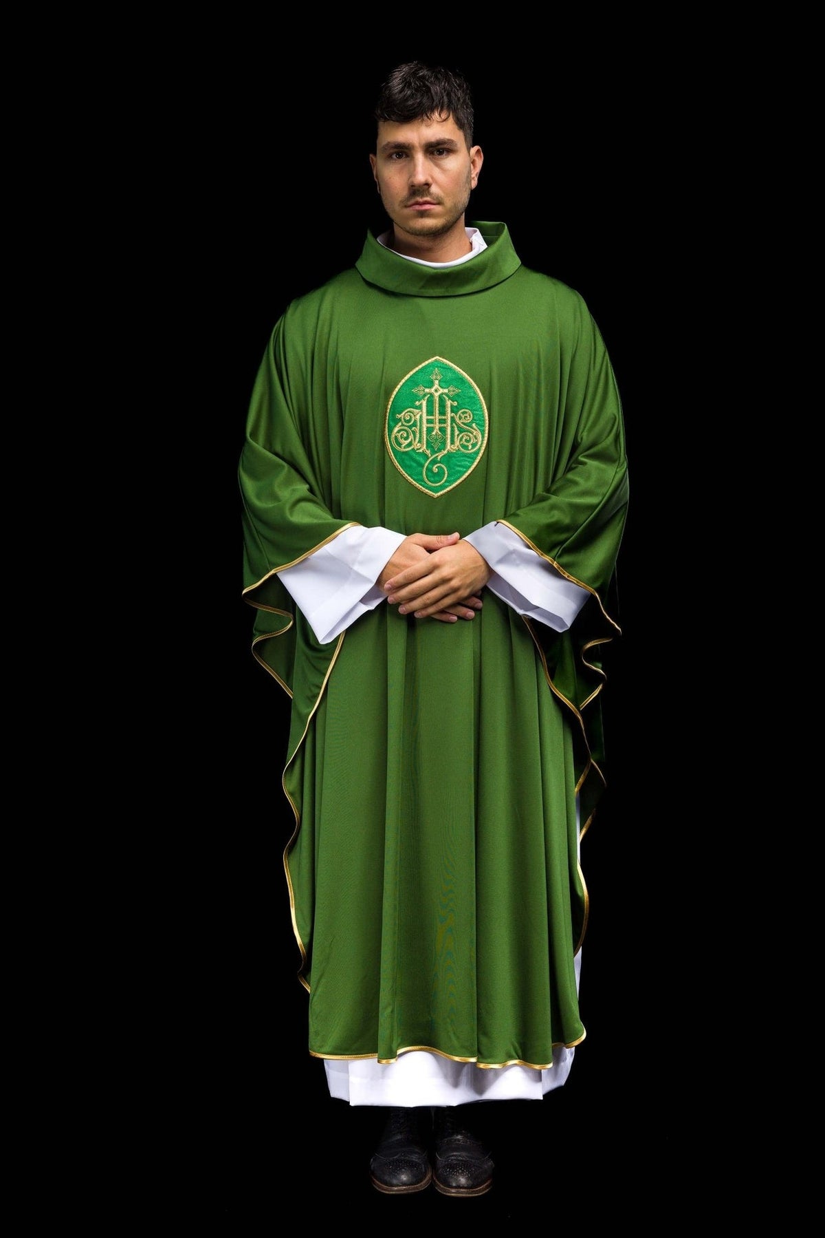 Green embroidered chasuble with gold trim and central gold embroidery, full front view