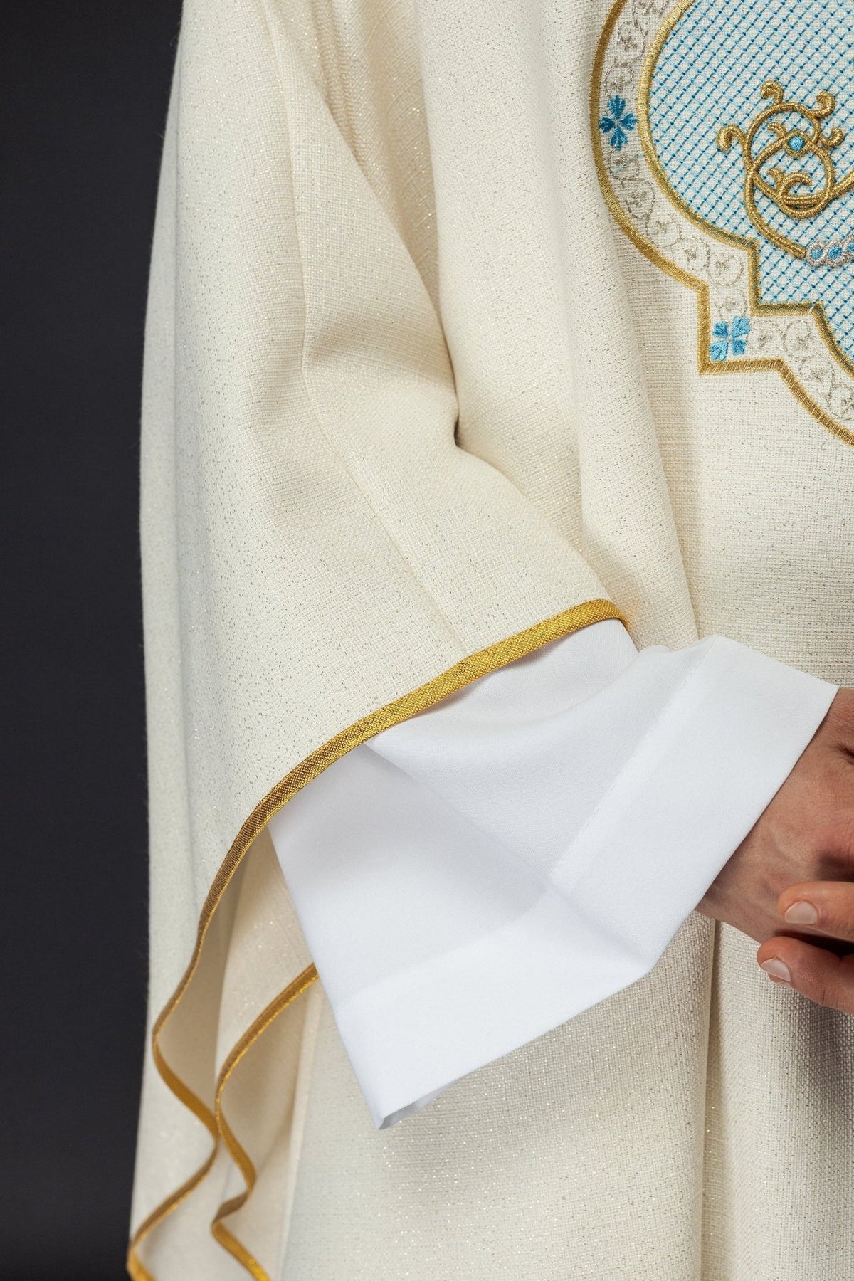 Ecru Marian chasuble, close-up of gold trim on the sleeve edge