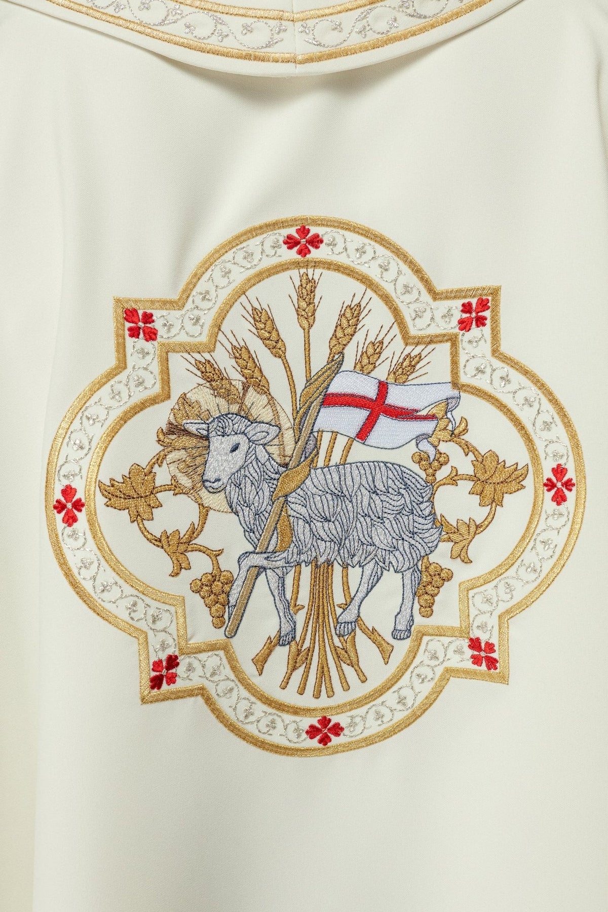 Agnus Dei chasuble back view with embroidered lamb motif and gold-trimmed collar