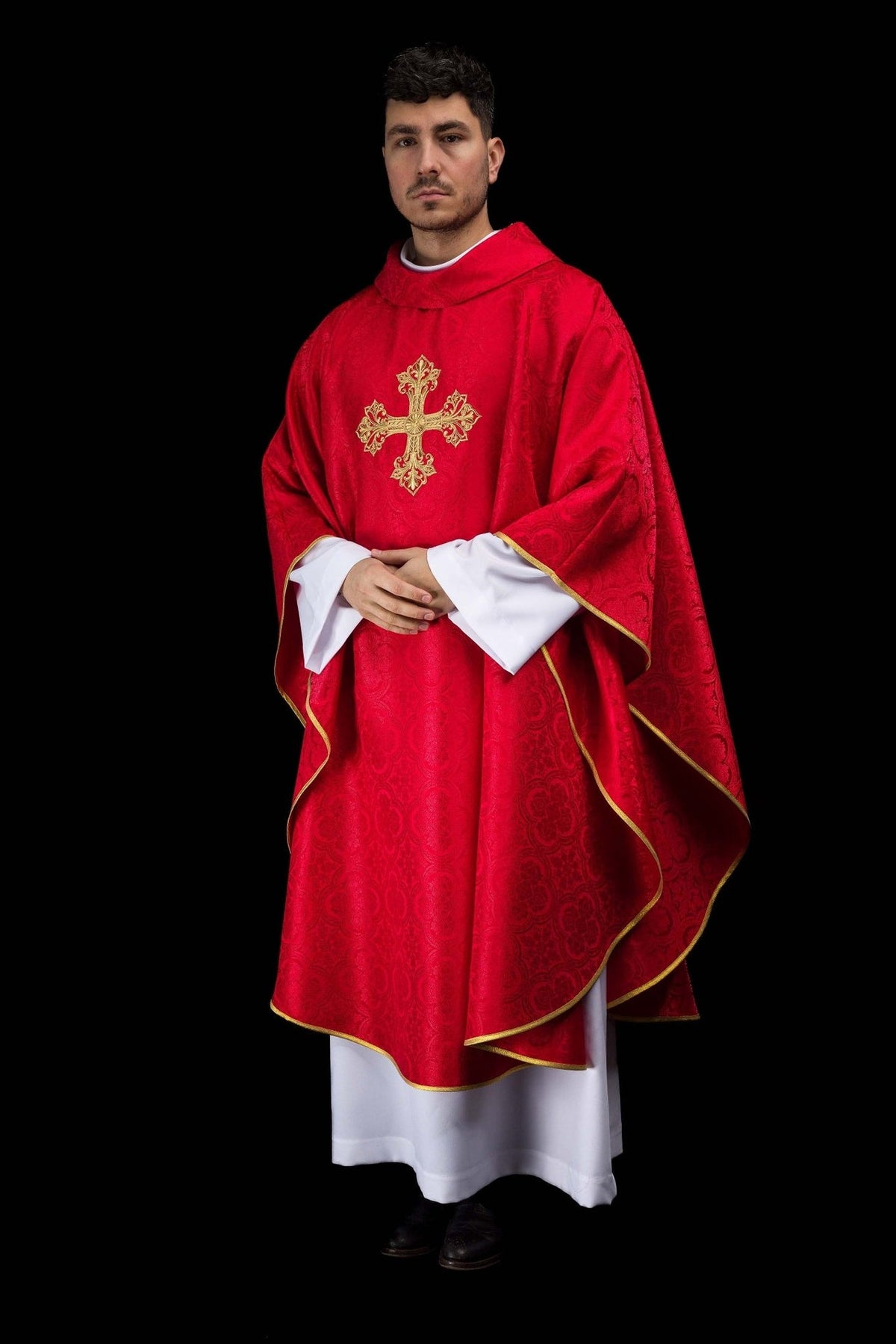 Red chasuble three-quarter front view with gold cross embroidery and trim
