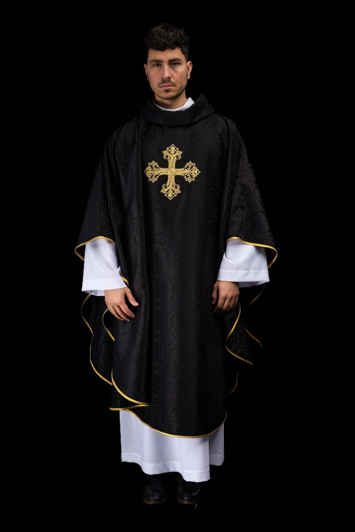 Black chasuble front view with gold cross, stand-up collar and gold trim
