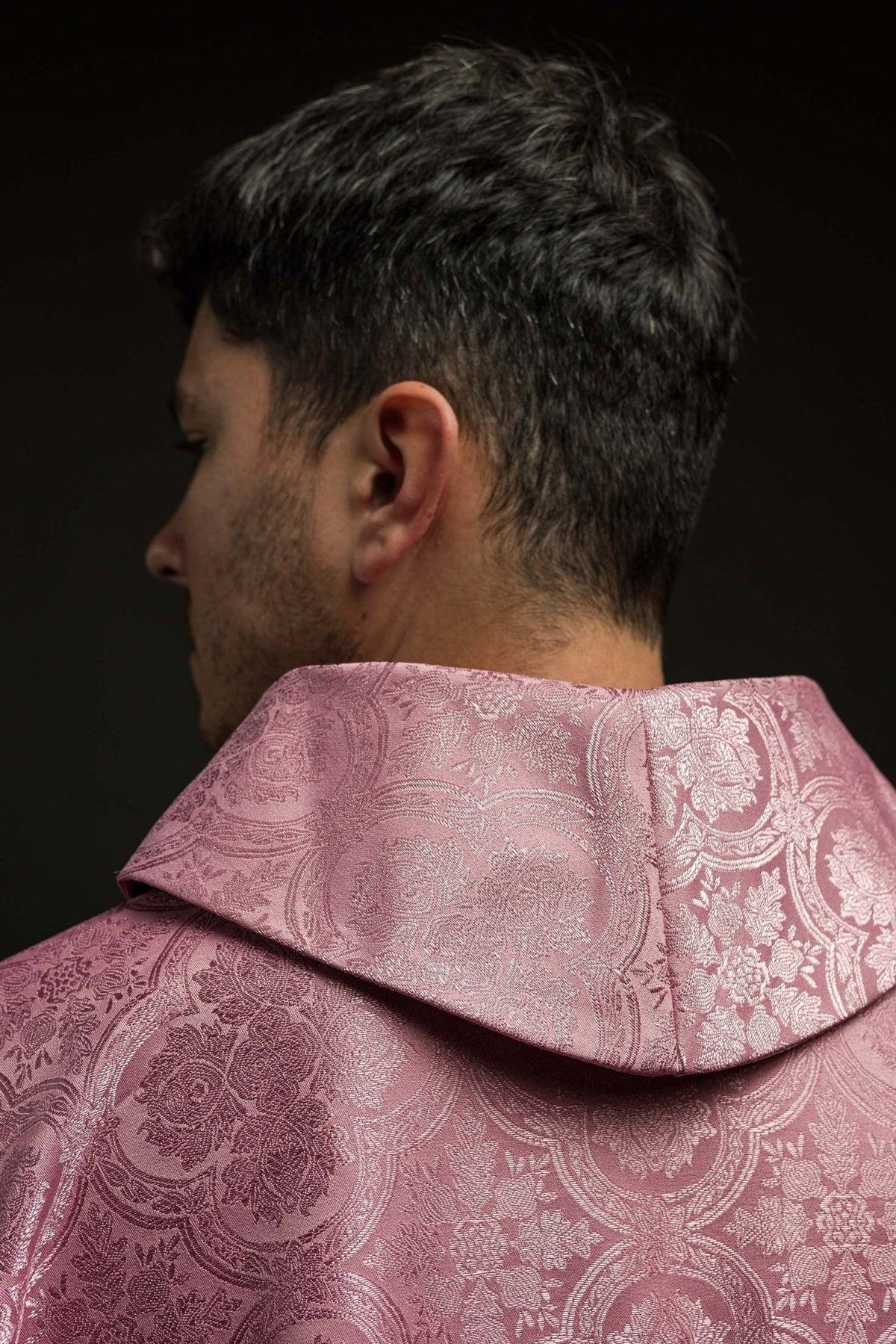 Rose chasuble back close-up showing patterned fabric and stand-up collar