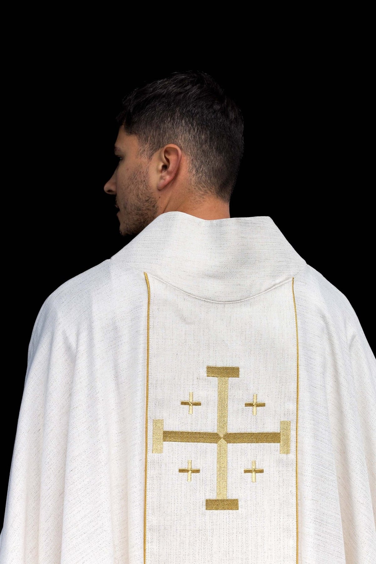 Back view of ecru chasuble with gold Jerusalem cross embroidery