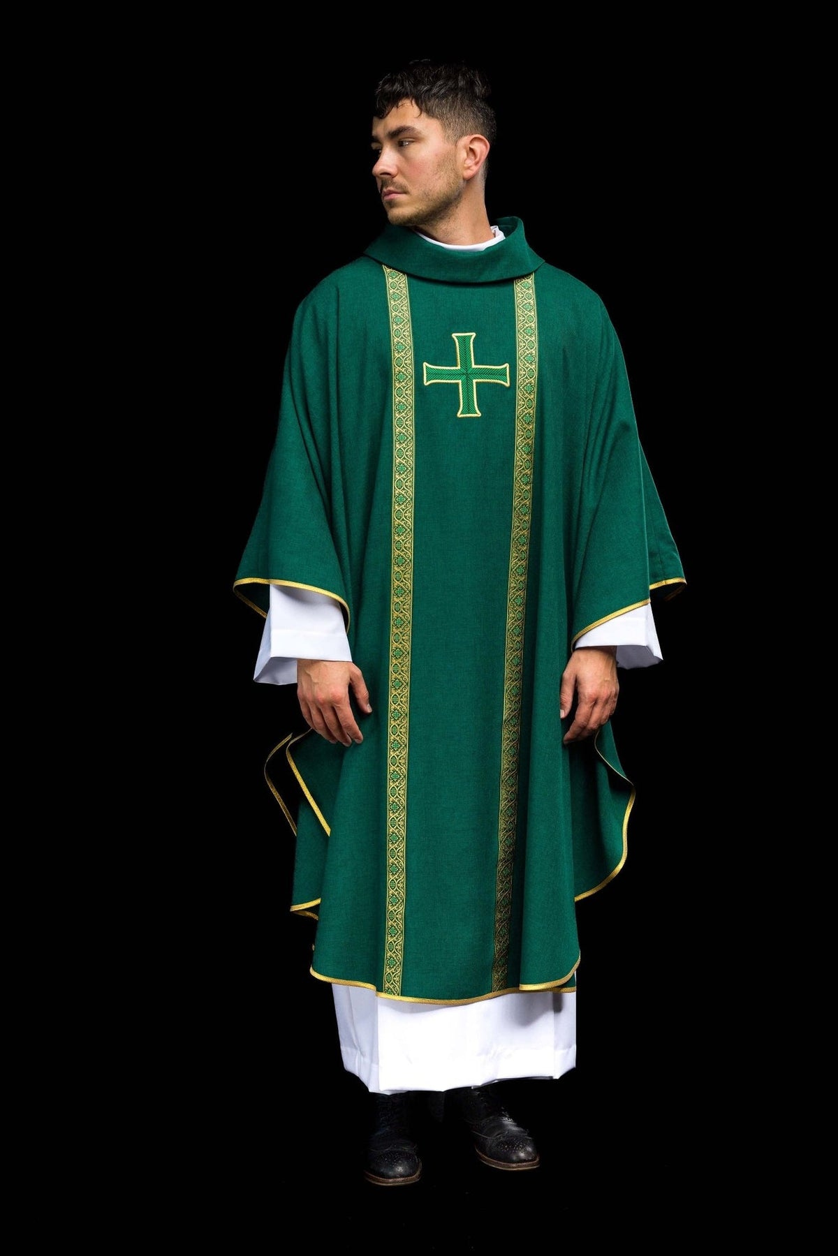 Green chasuble angled front view with gold trim and embroidered cross