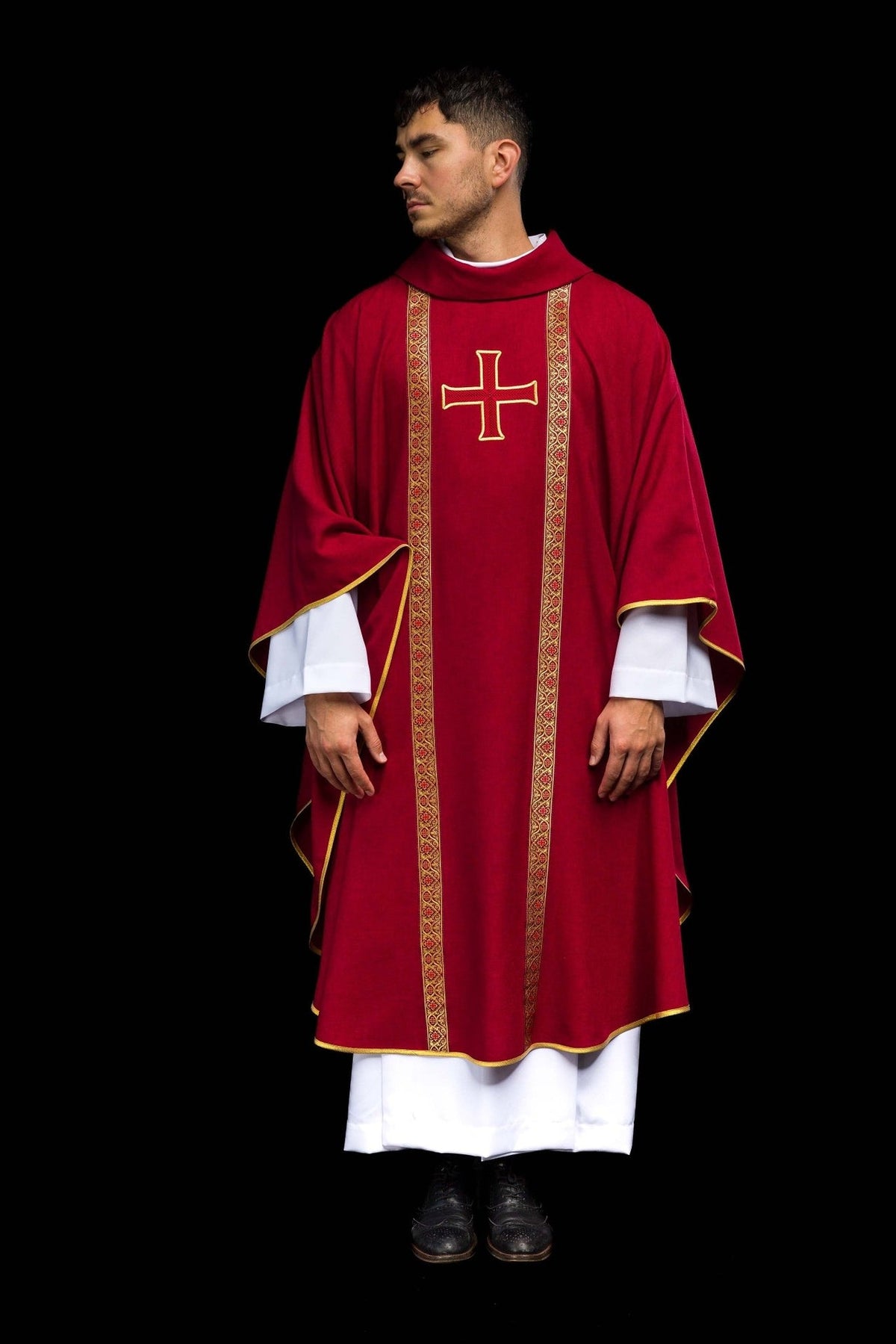 Red chasuble back view with embroidered cross, jacquard orphreys and gold trim