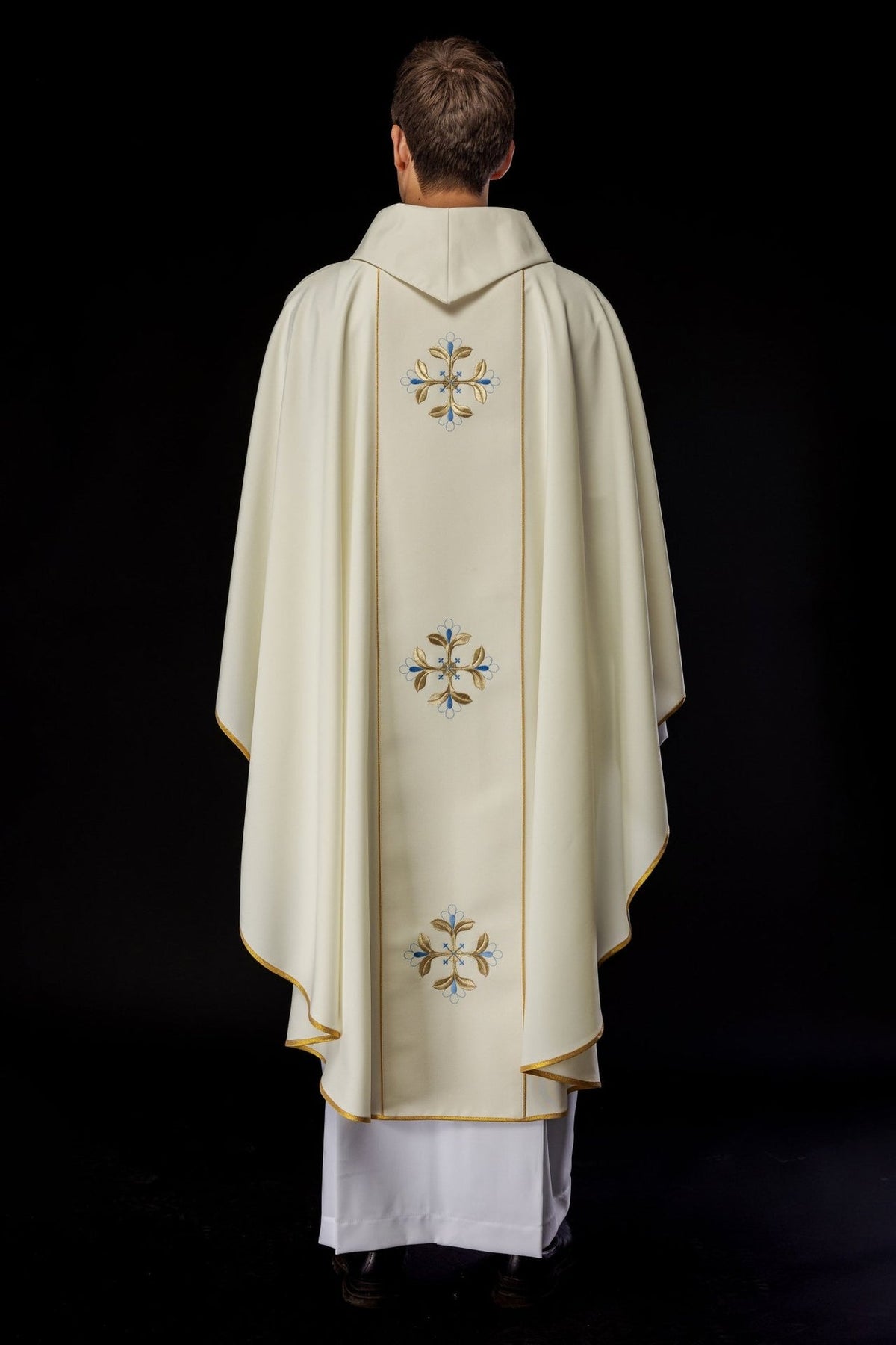 Chasuble full back view with embroidered blue and gold floral motifs on the orphrey