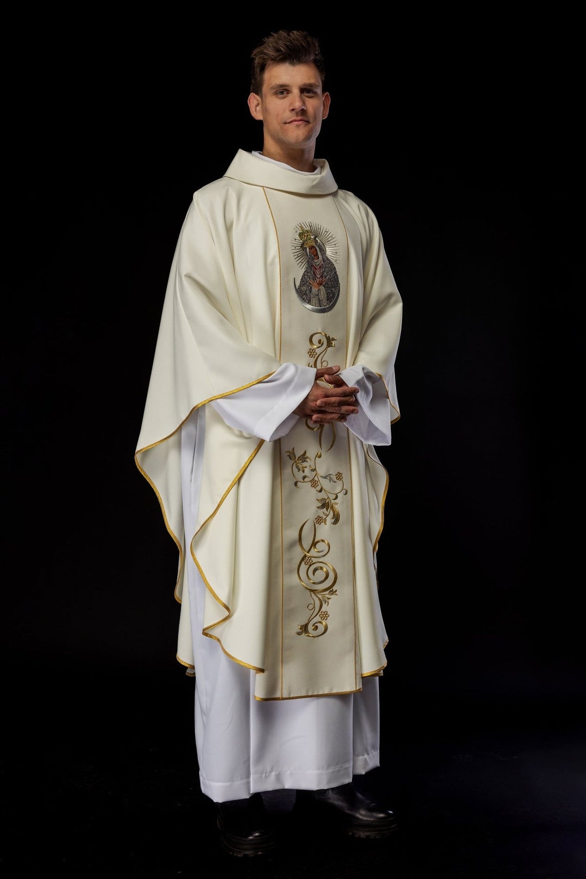 Chasuble three-quarter front view with Our Lady embroidery, gold trim and floral orphrey