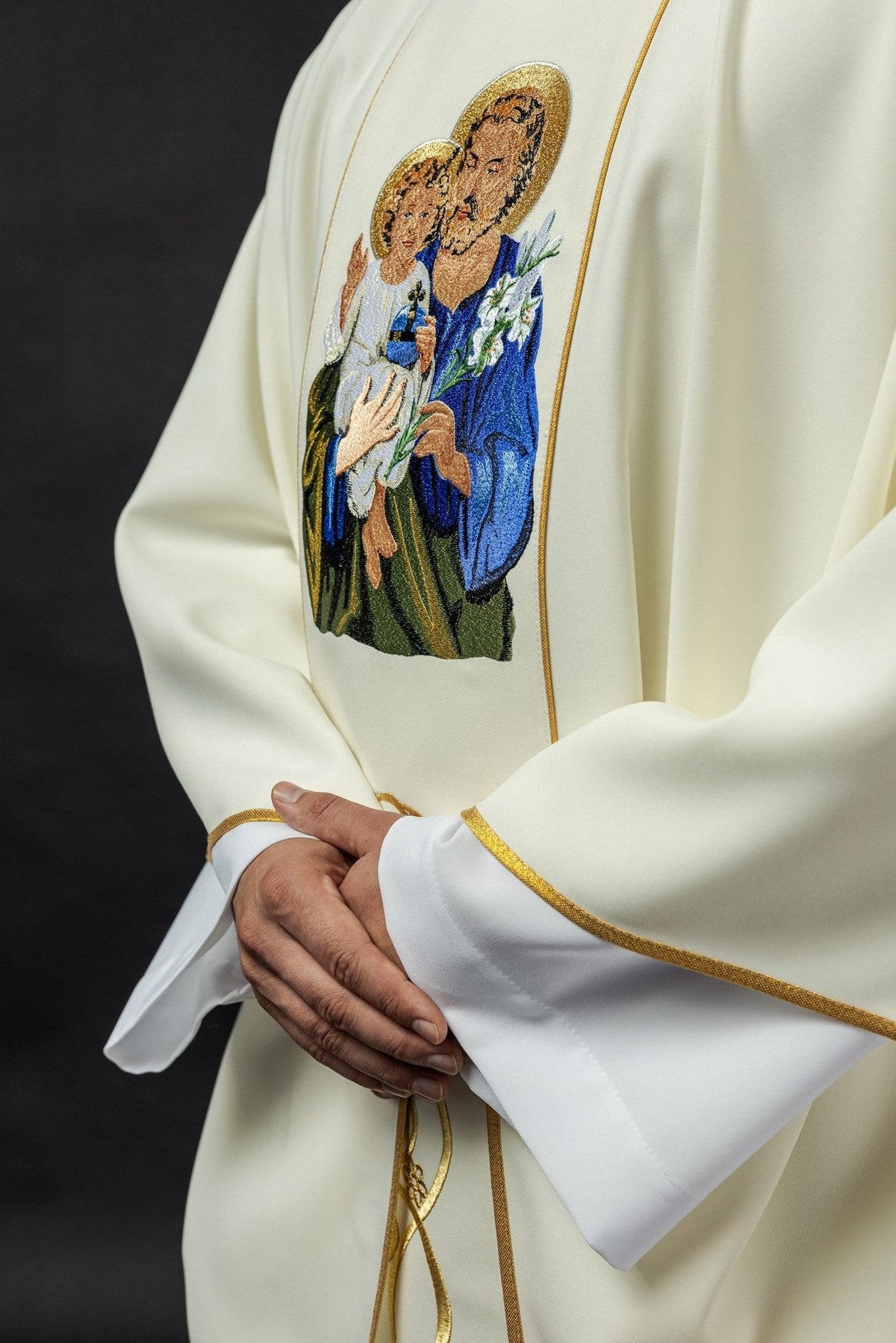 Saint Joseph chasuble, angled front view showing embroidered image and gold edging