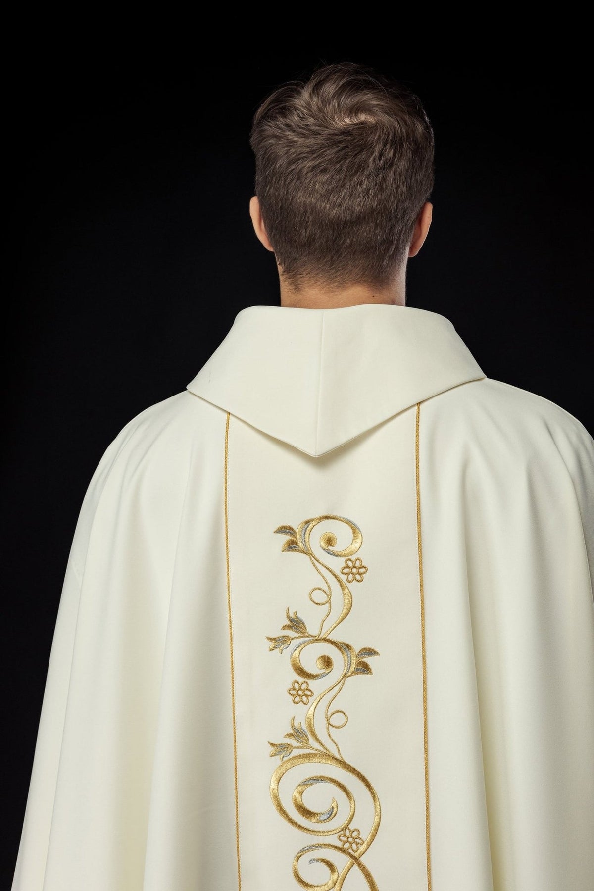 Ivory chasuble back view with gold floral orphrey embroidery