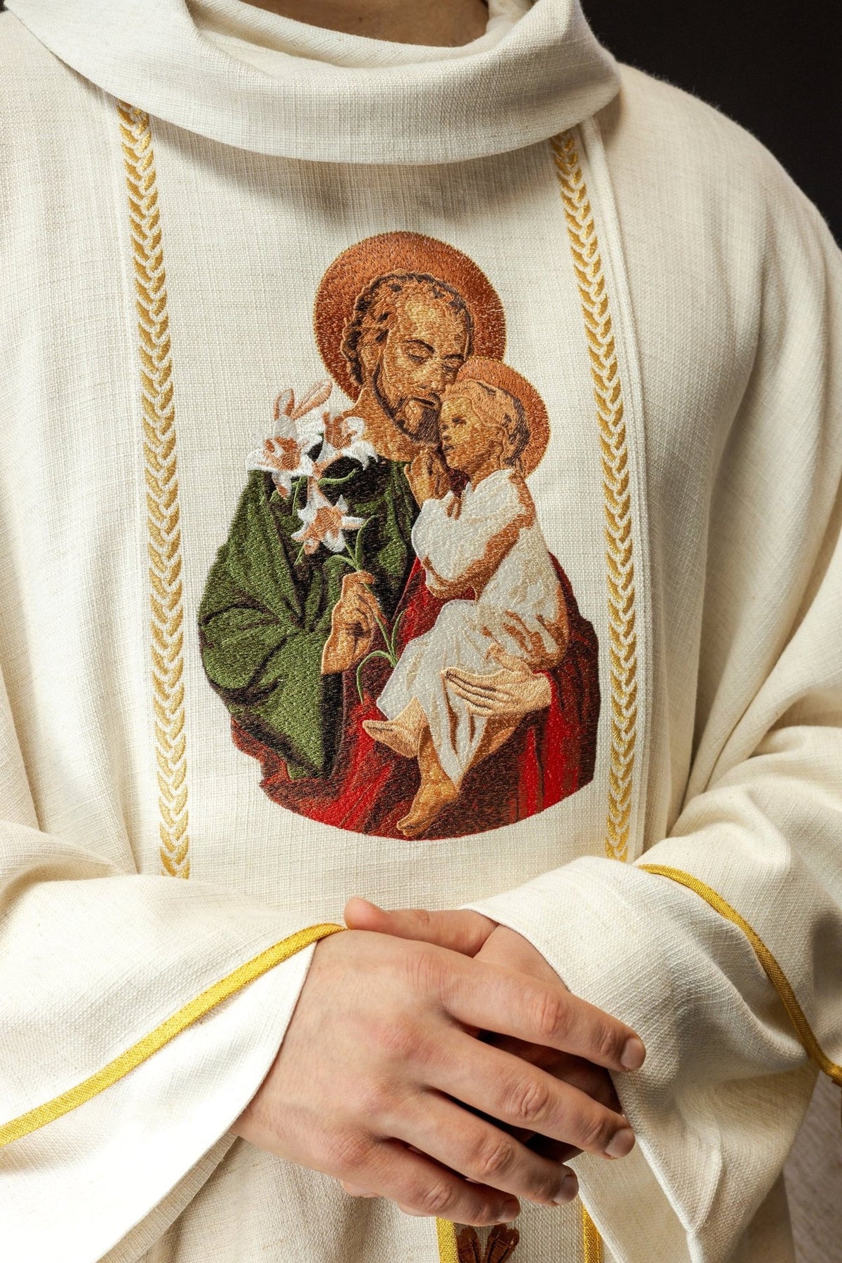 Saint Joseph chasuble, close-up of Saint Joseph embroidery and gold sleeve trim