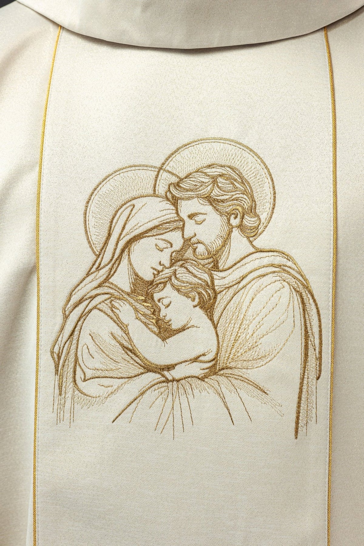 Christmas Catholic chasuble, close-up of embroidered Holy Family on the ivory front