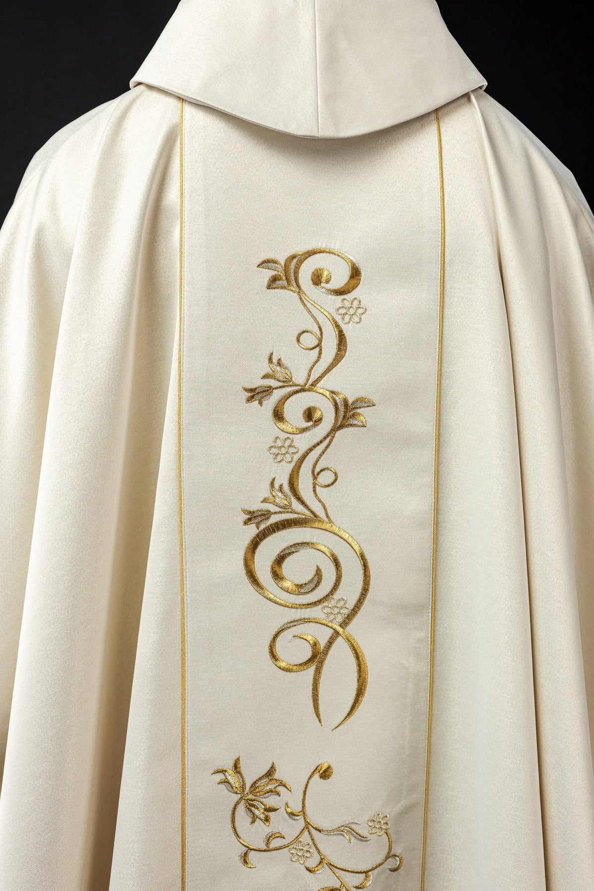 Christmas Catholic chasuble, back view with embroidered gold scrollwork on the orphrey