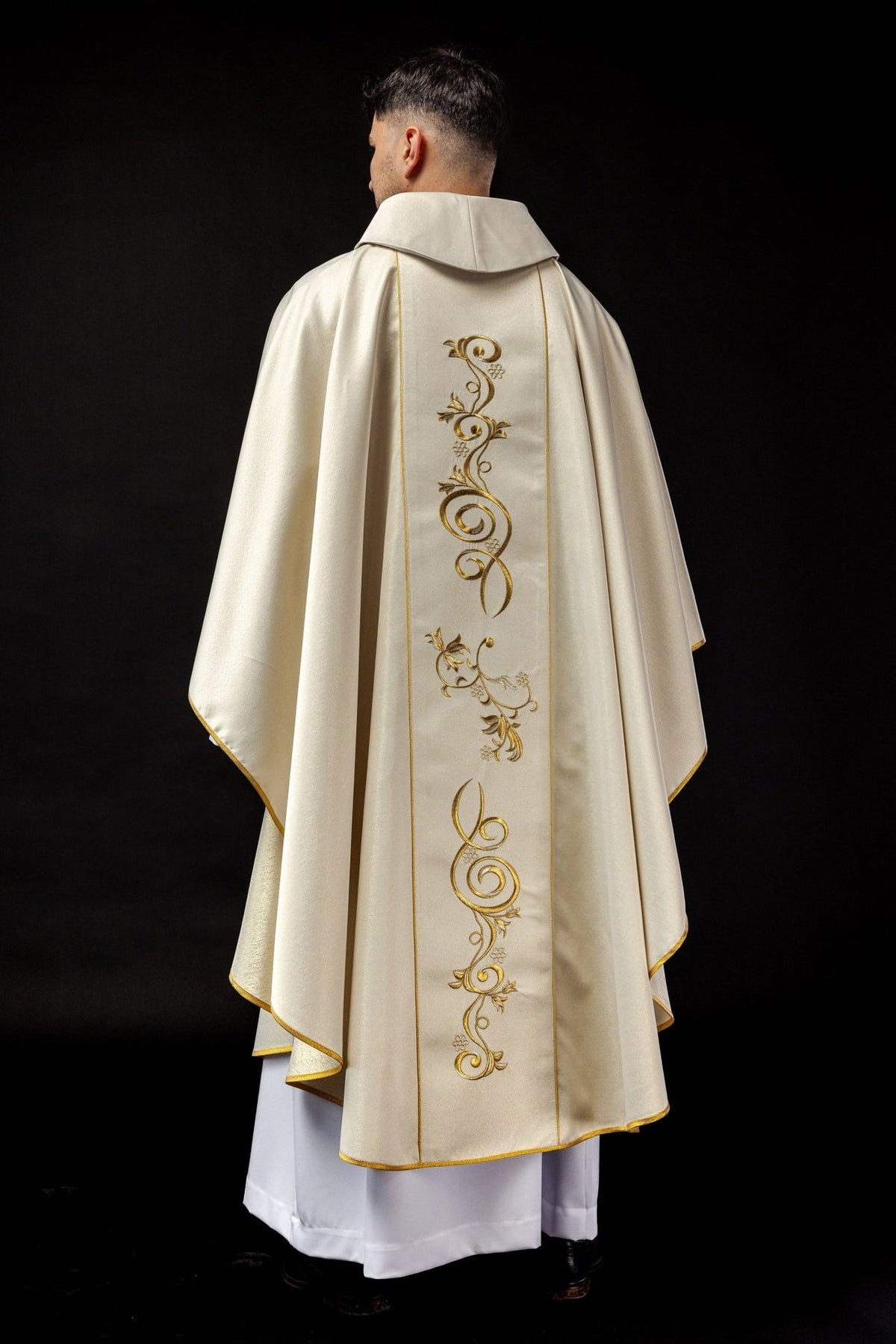 Christmas Catholic chasuble, back close-up showing gold embroidered scrollwork and trim