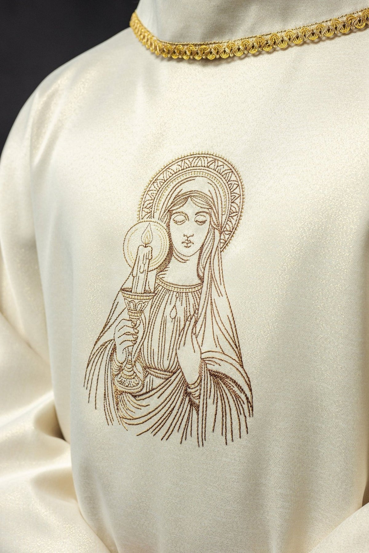 Candlemas chasuble close-up with embroidered Our Lady and candle motif