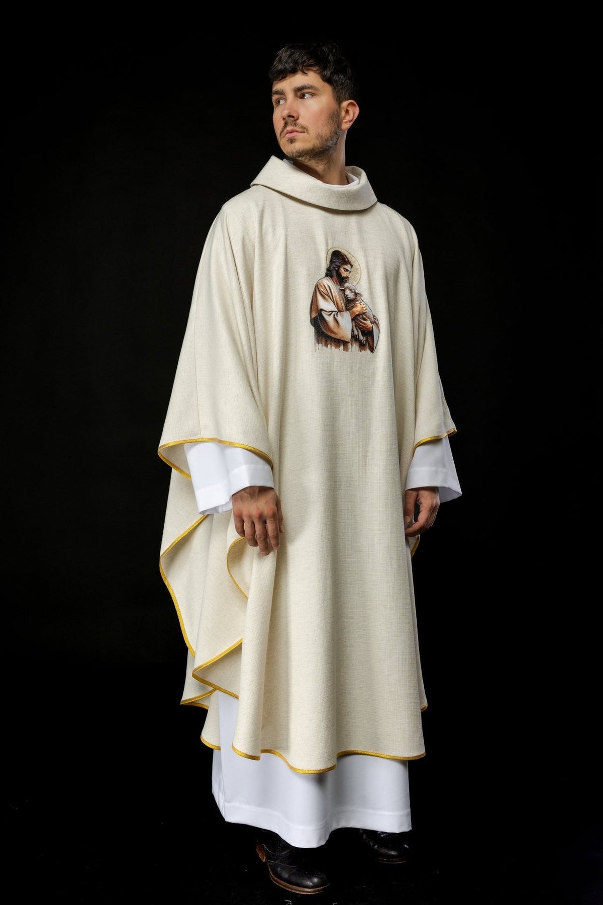 Ecru chasuble front view with Good Shepherd embroidery and gold trim