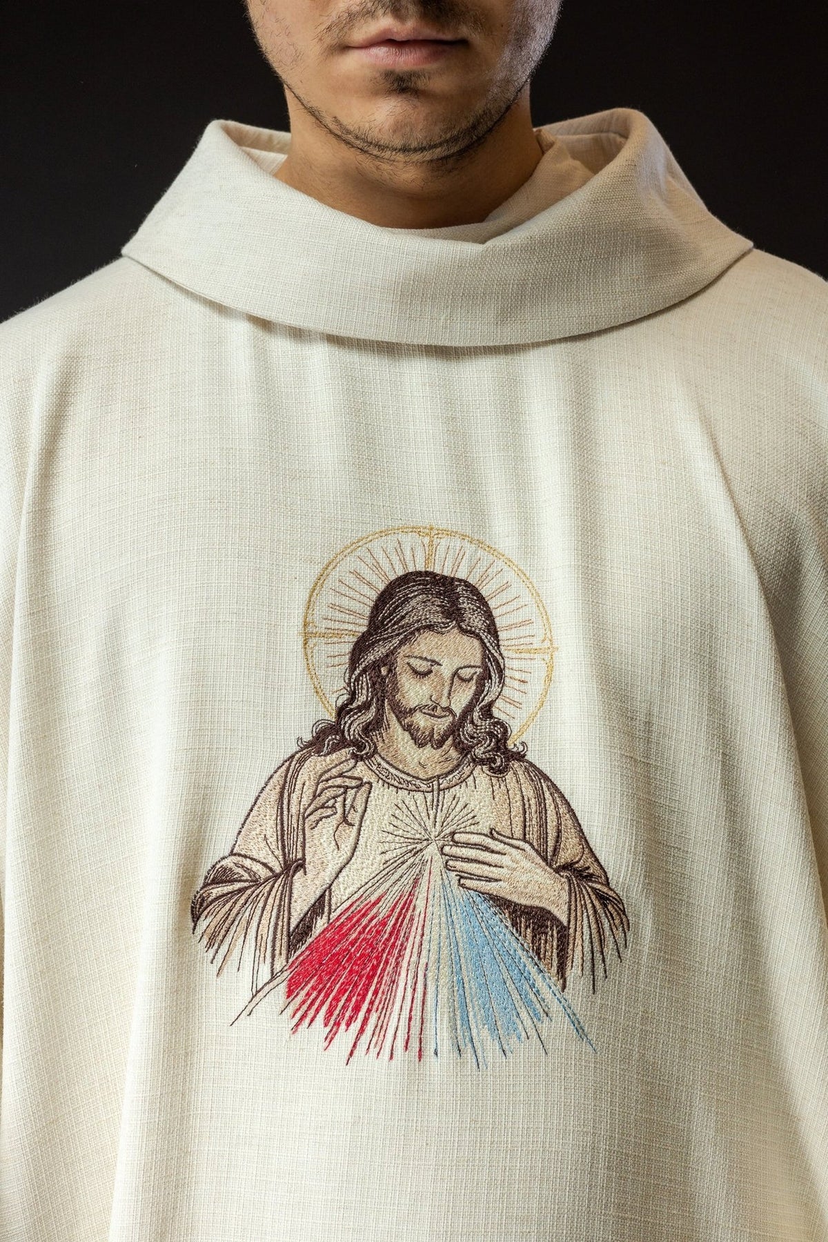 Ecru chasuble close-up showing stand-up collar and Divine Mercy embroidery